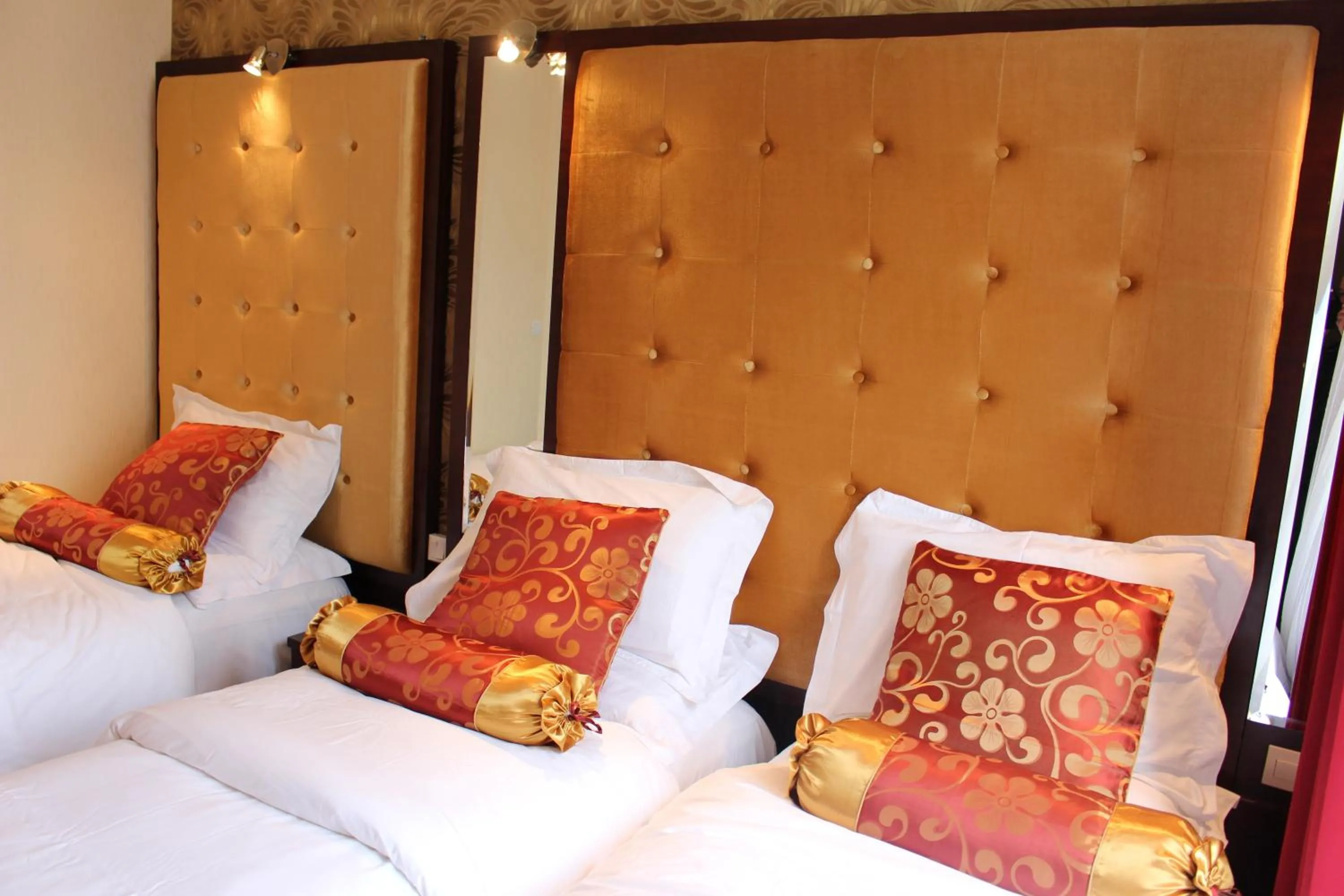 Bed in Hôtel des Buttes Chaumont