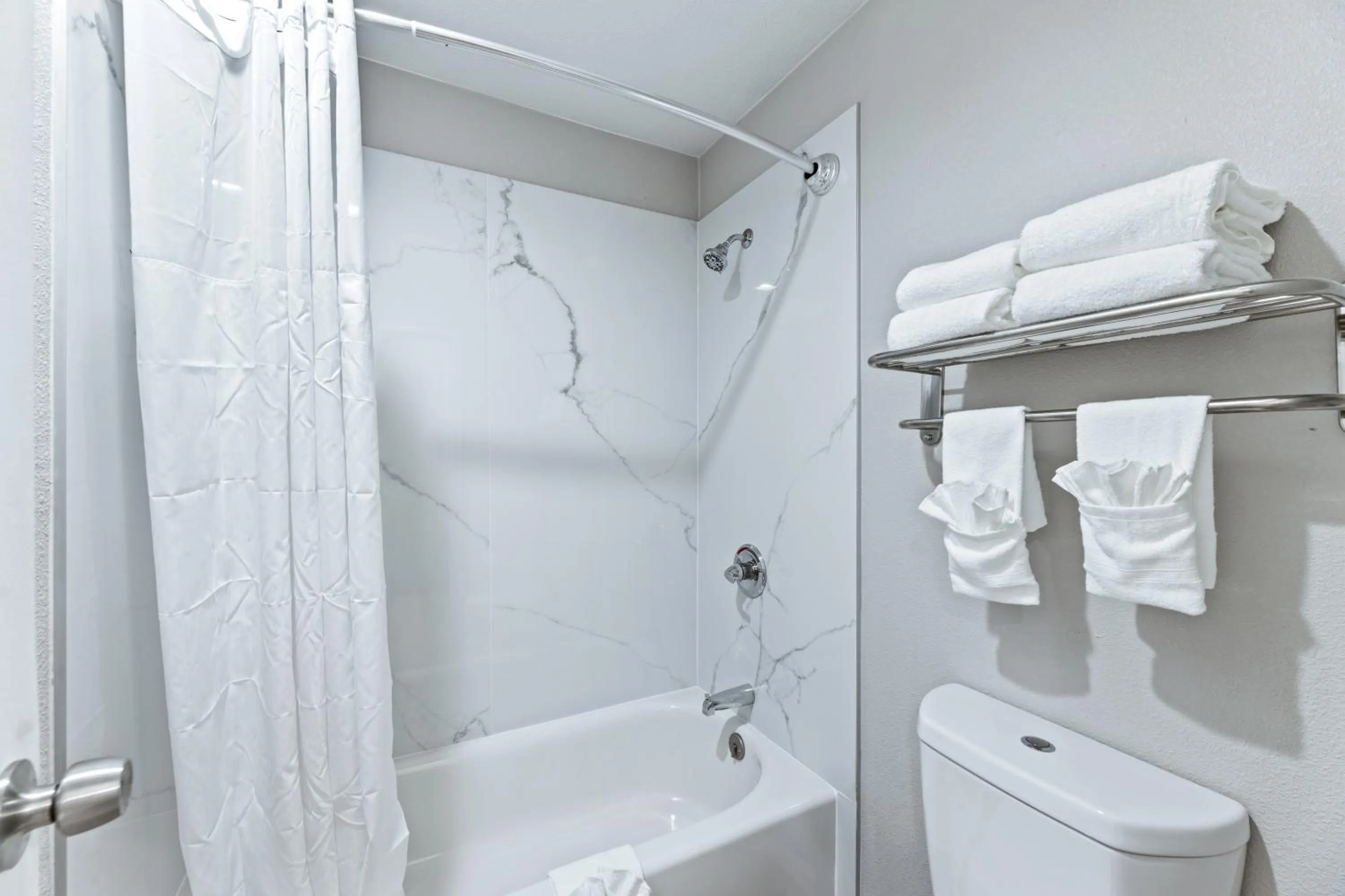 Bathroom in Days Inn by Wyndham McKinney