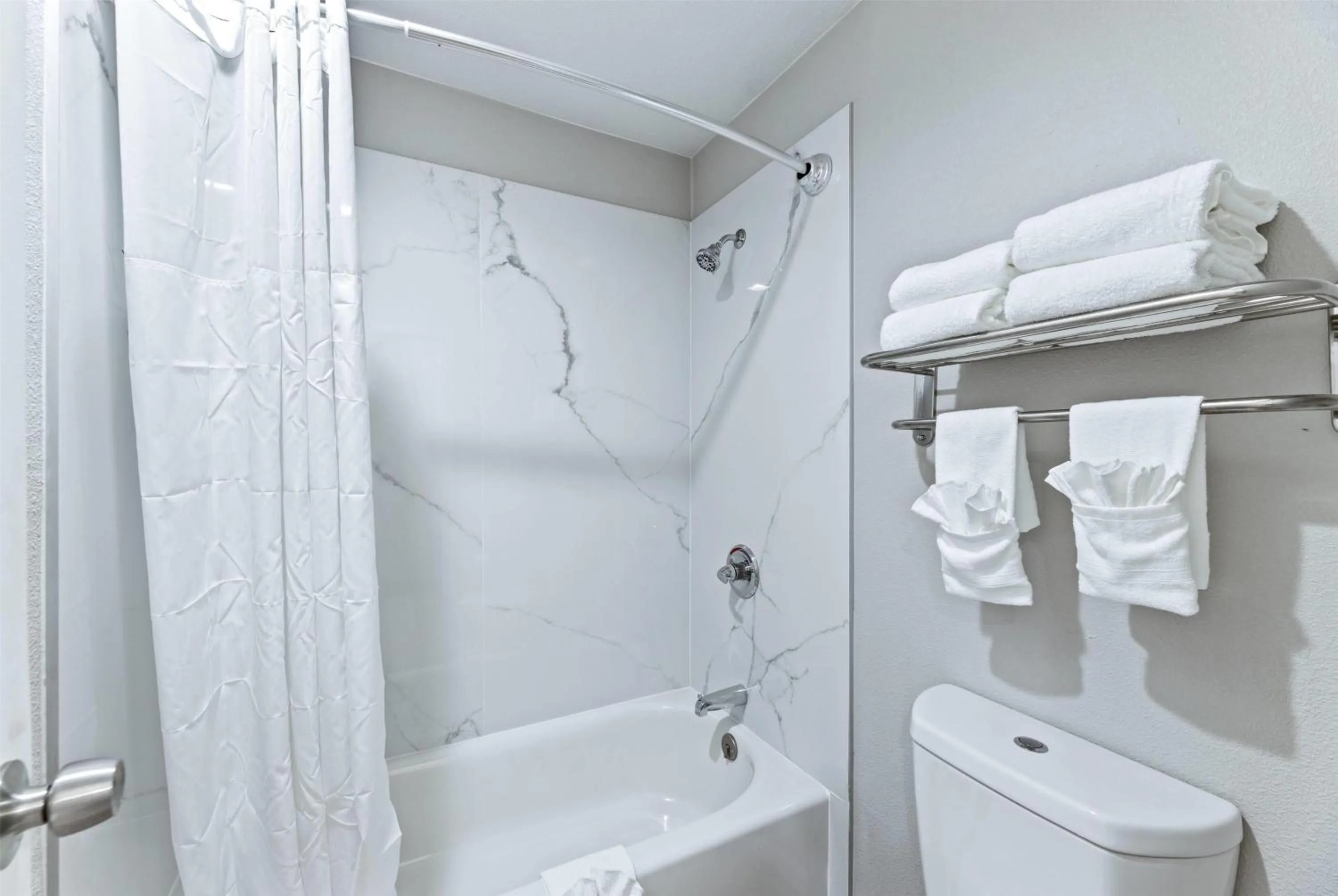 Bathroom in Days Inn by Wyndham McKinney