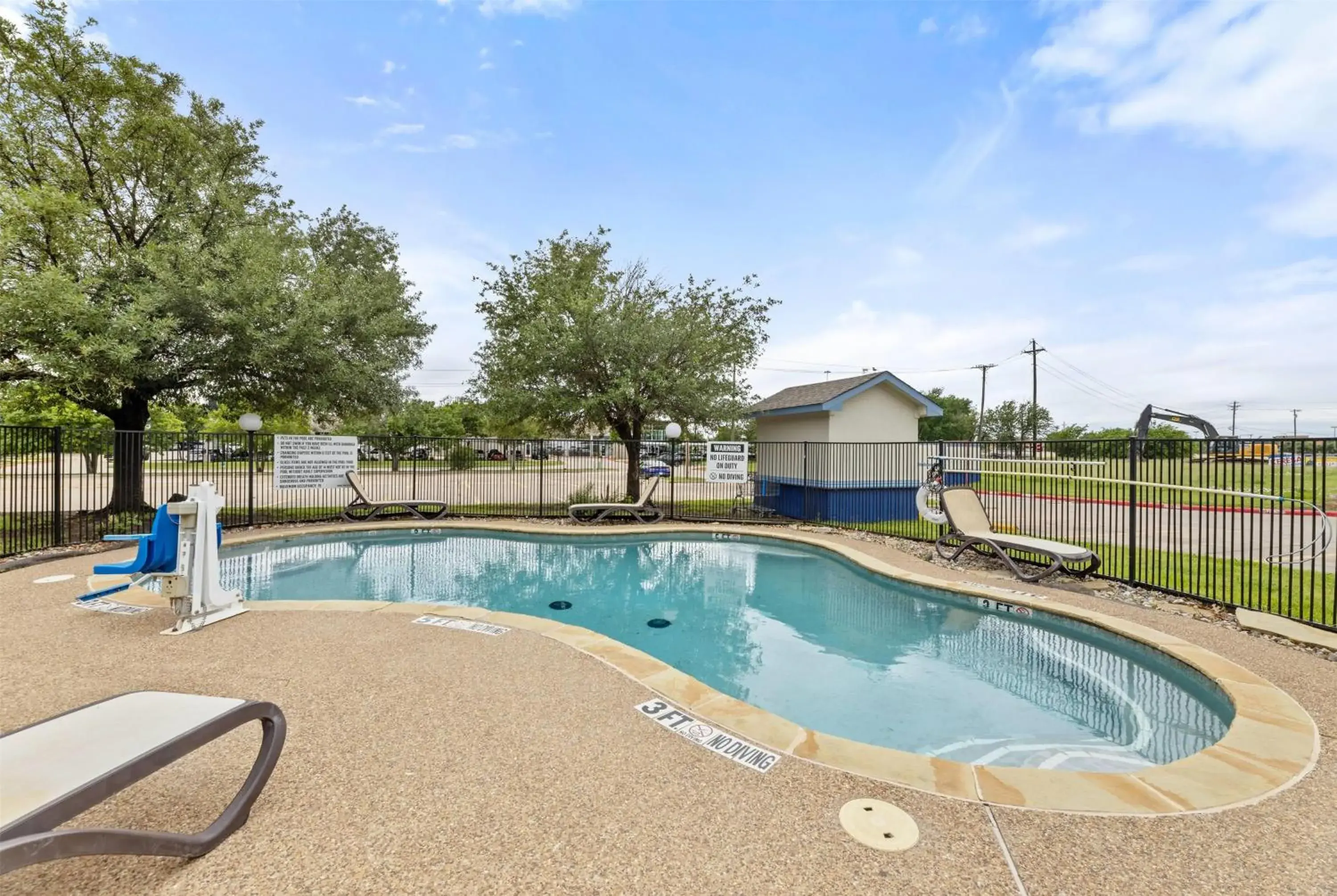 Pool view in Days Inn by Wyndham McKinney Pool view in Days Inn by Wyndham McKinney