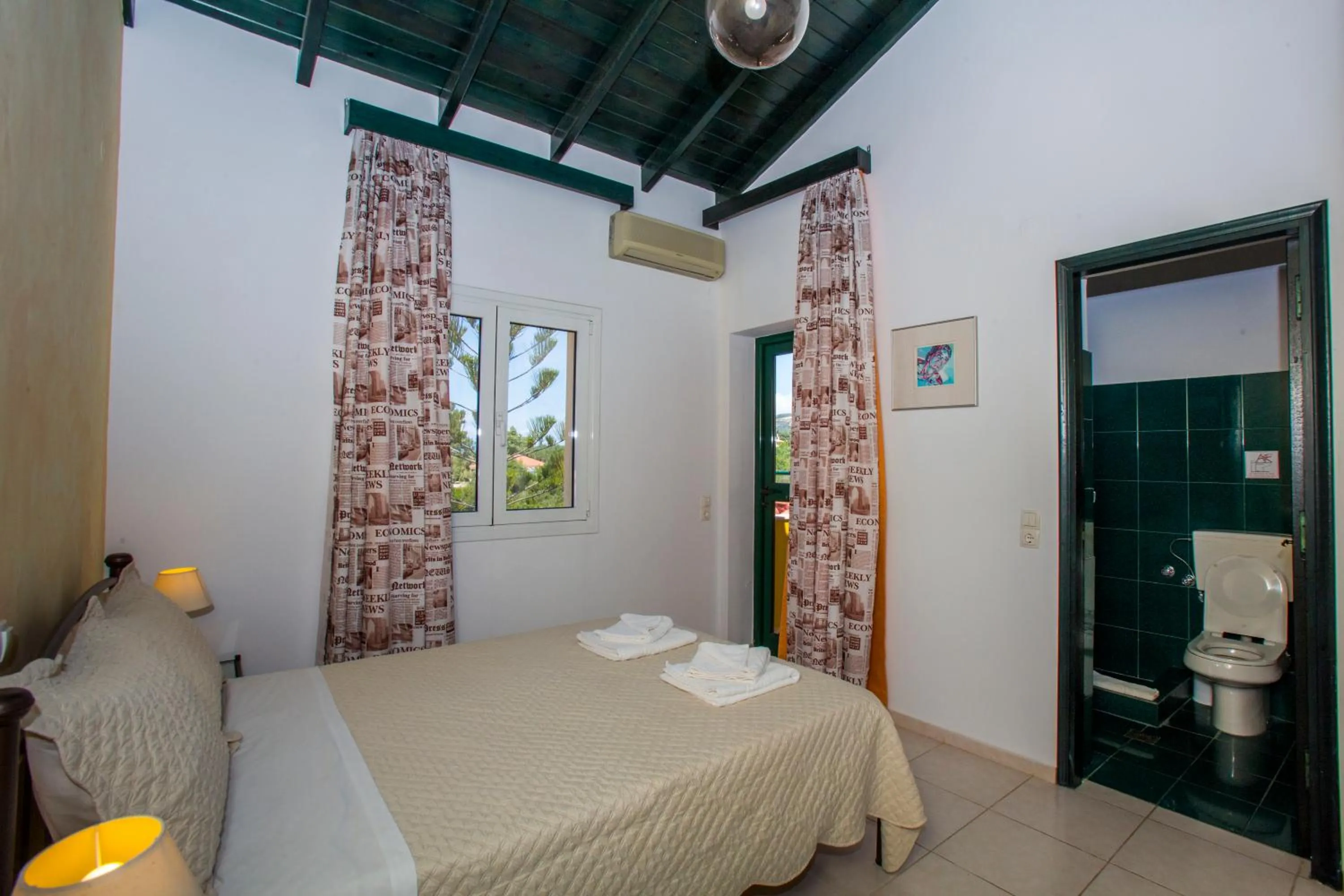 Bed in Sandy Beach Villas and Apartments
