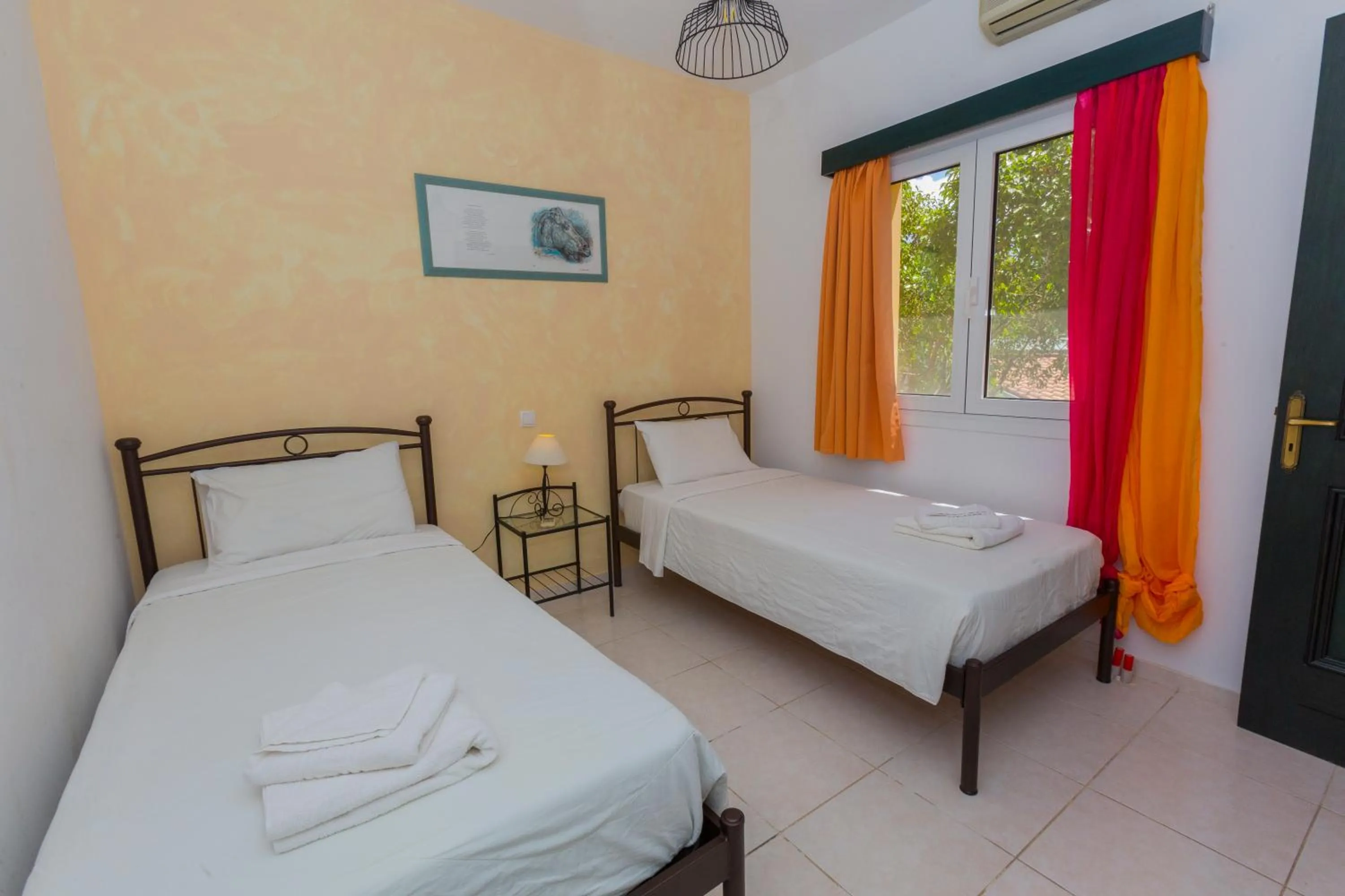 Bed in Sandy Beach Villas and Apartments