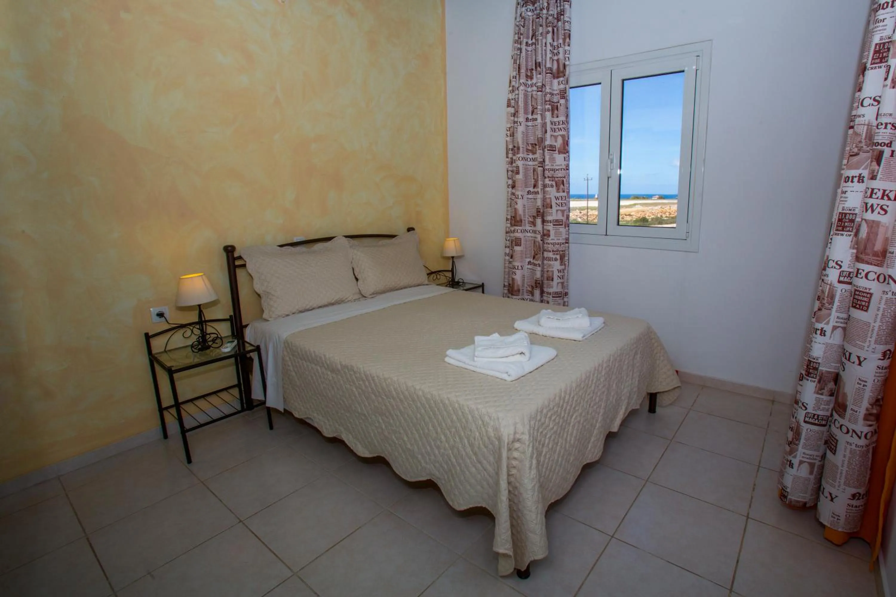 Bed in Sandy Beach Villas and Apartments
