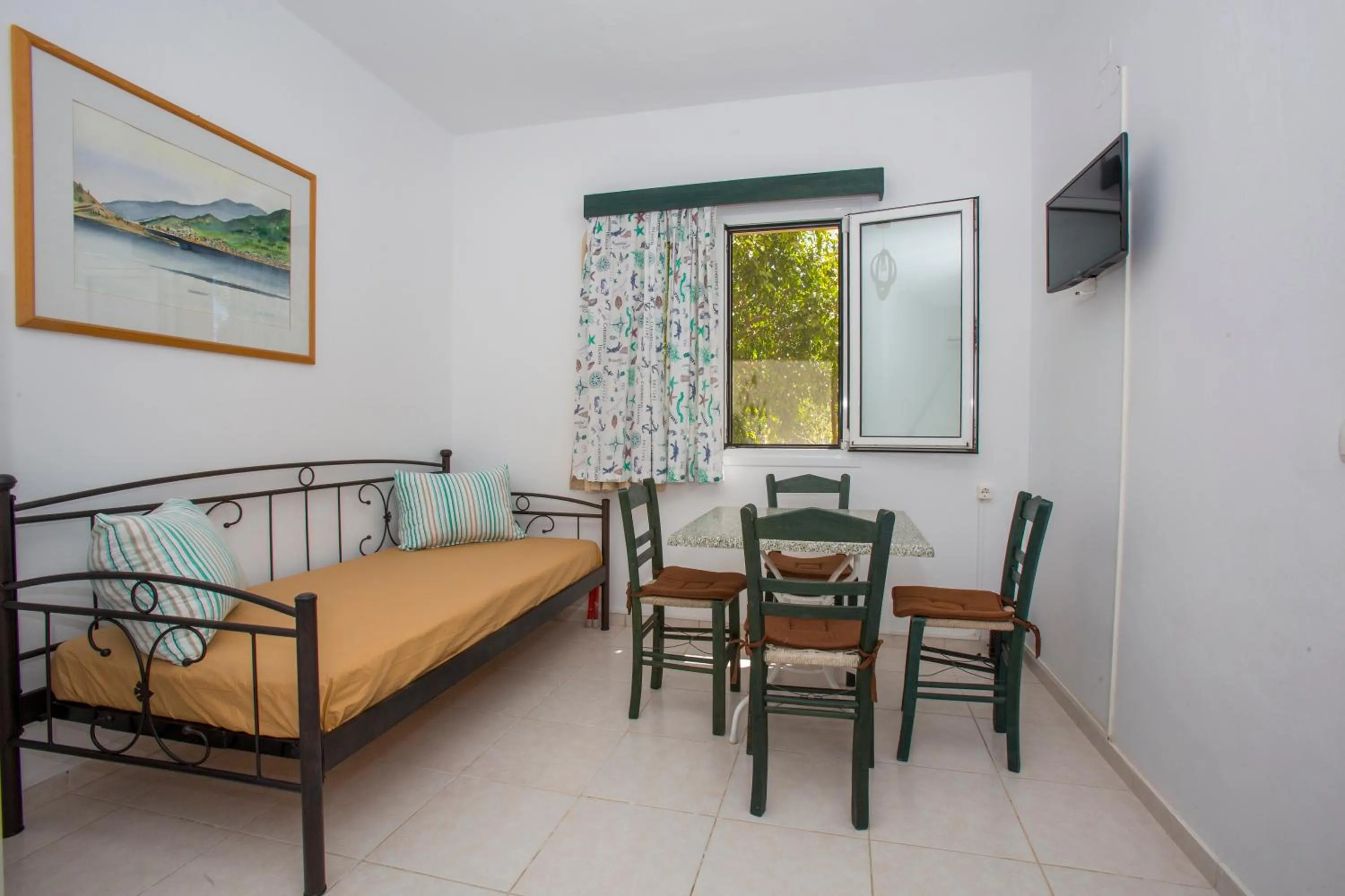 Seating area, Bed in Sandy Beach Villas and Apartments