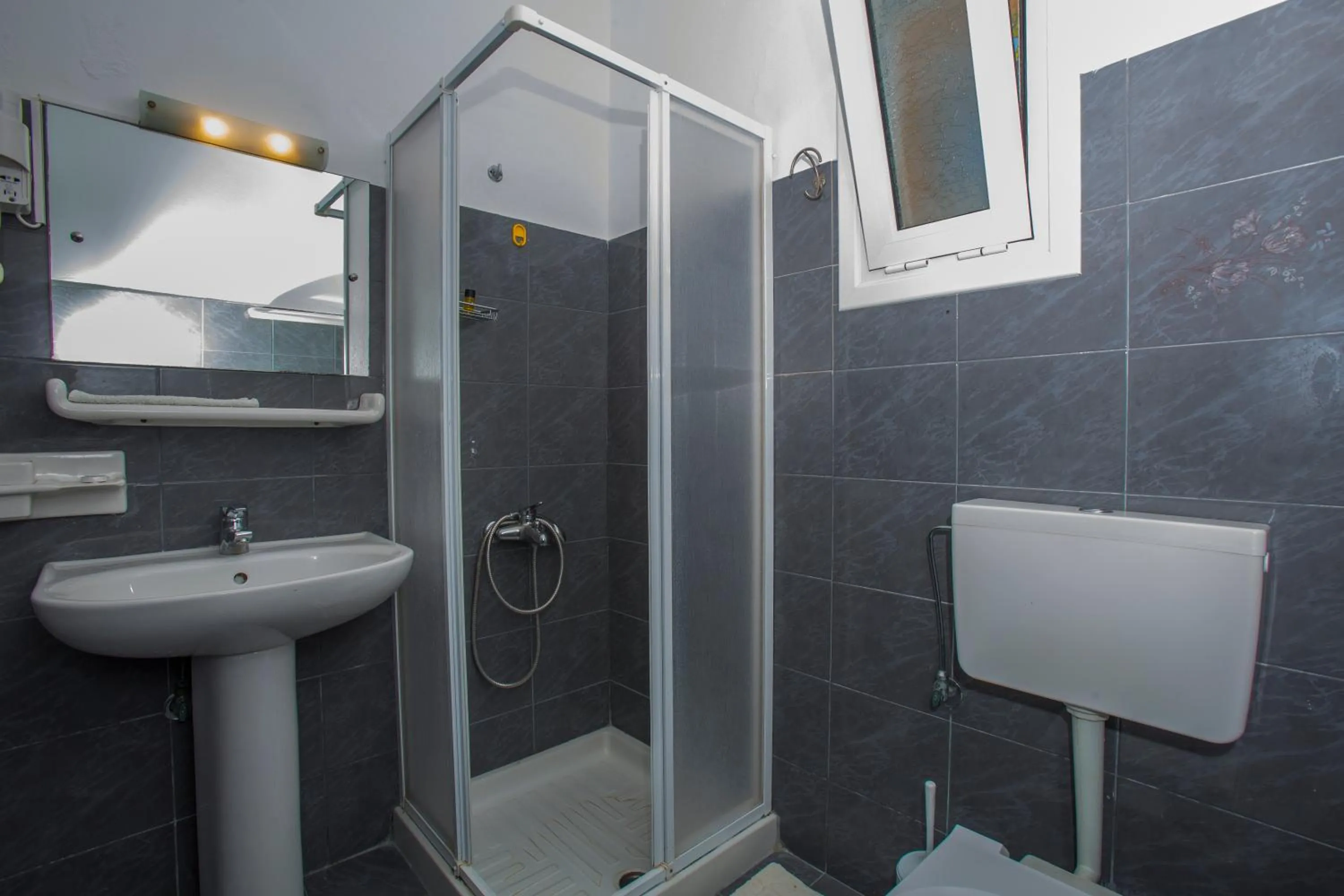 Shower in Sandy Beach Villas and Apartments