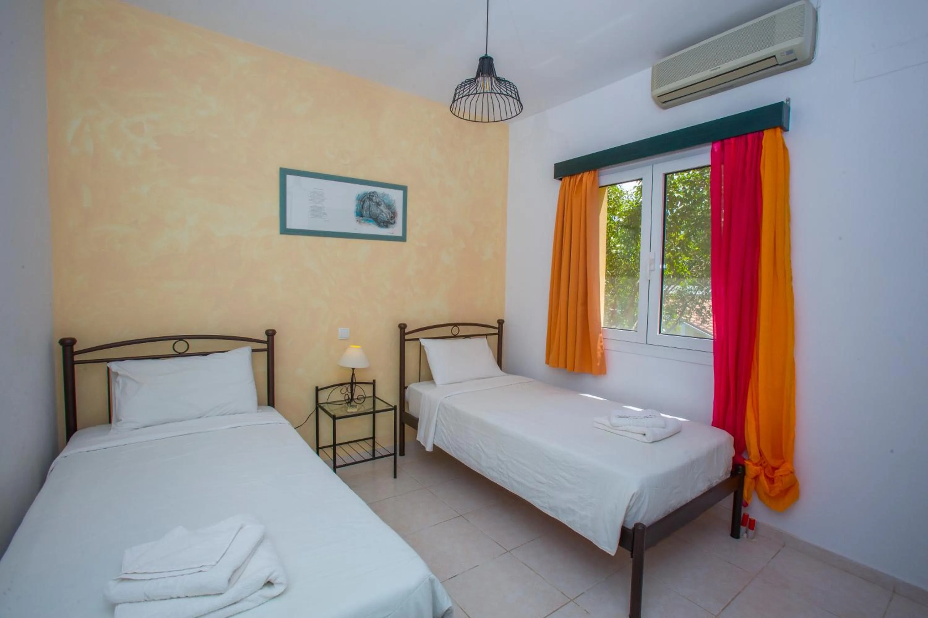 Bed in Sandy Beach Villas and Apartments