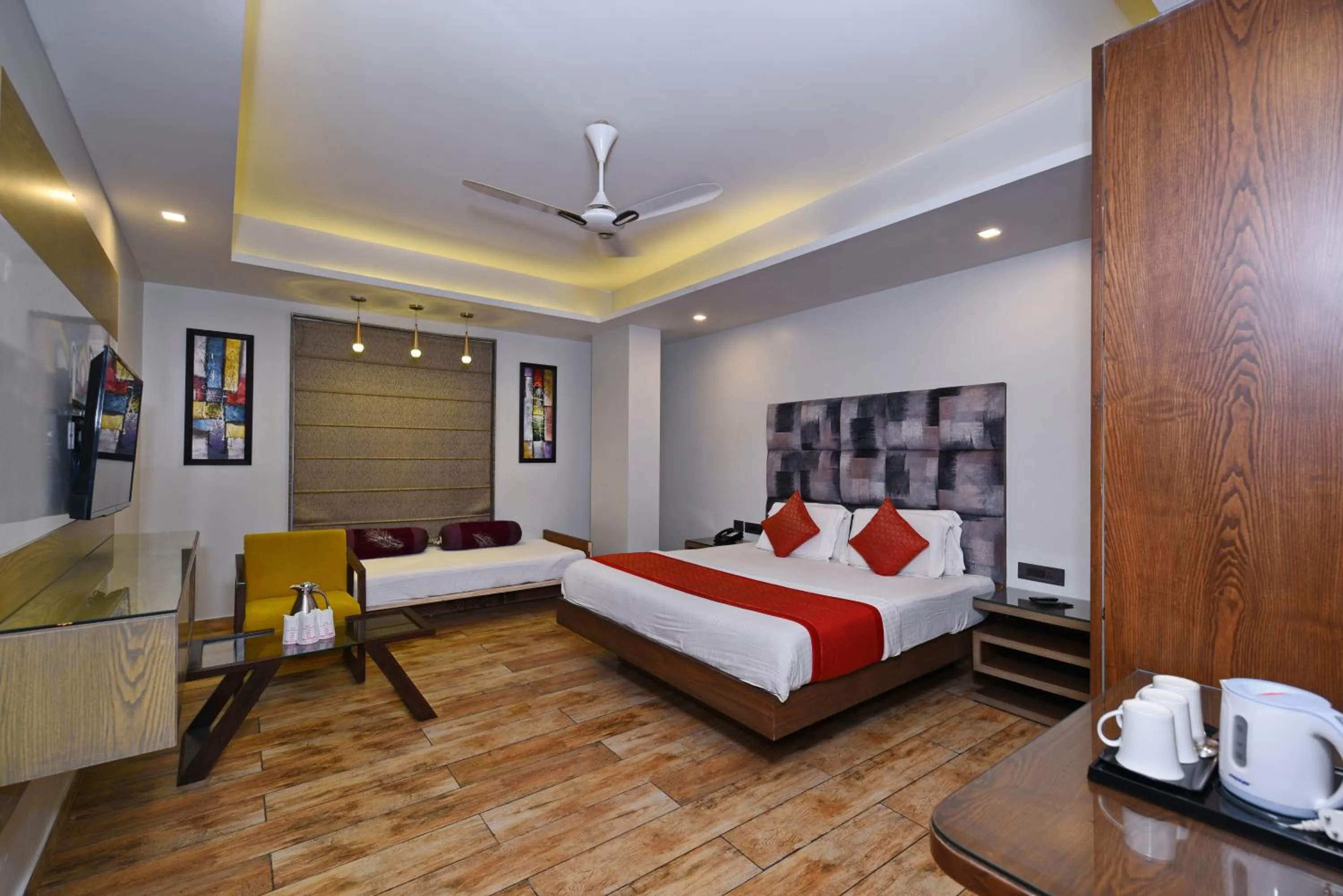 Bed in Staybook Hotel Nitya Maharani, Free Airport Pickup