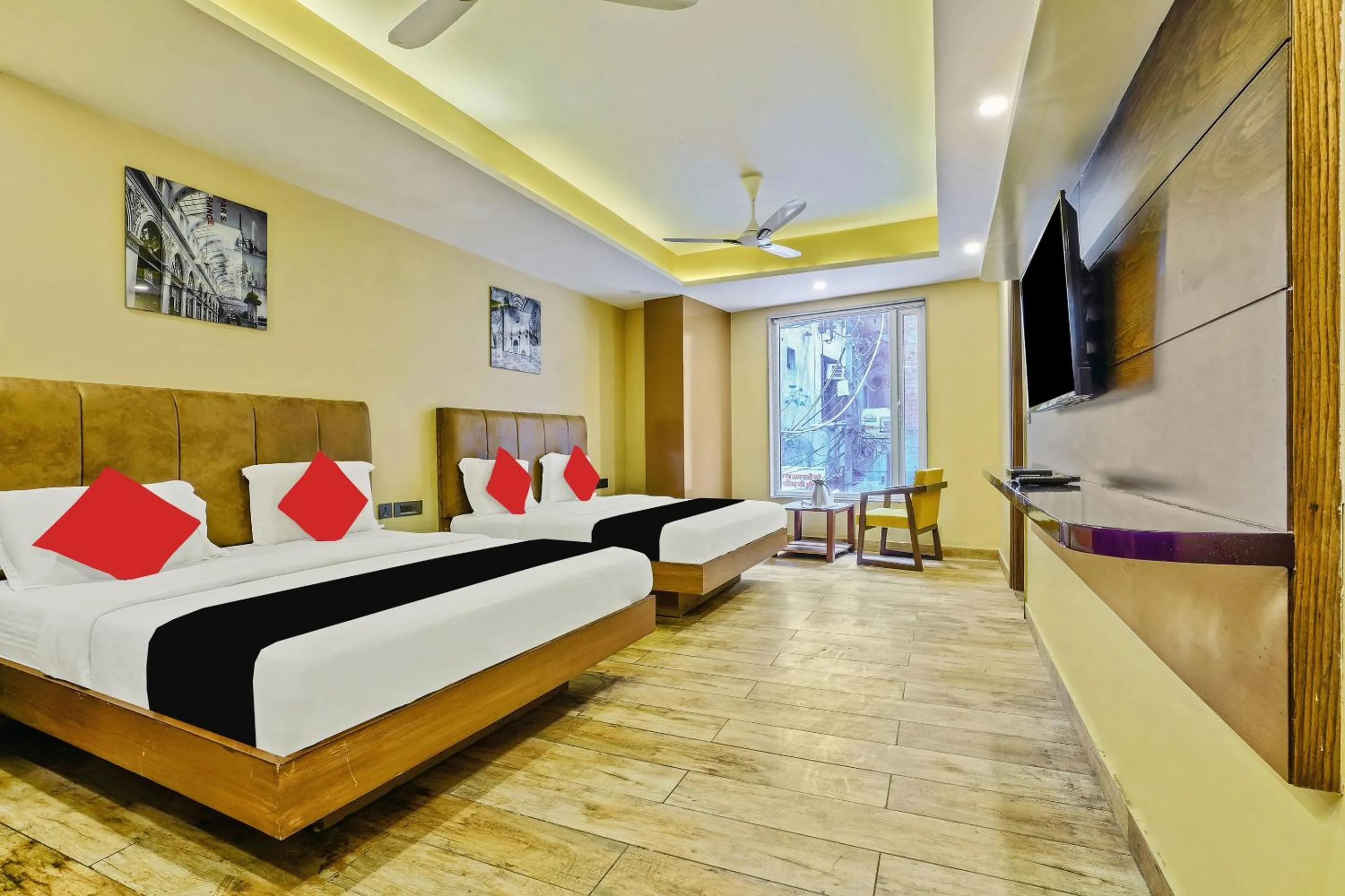 Bed in Staybook Hotel Nitya Maharani, Free Airport Pickup
