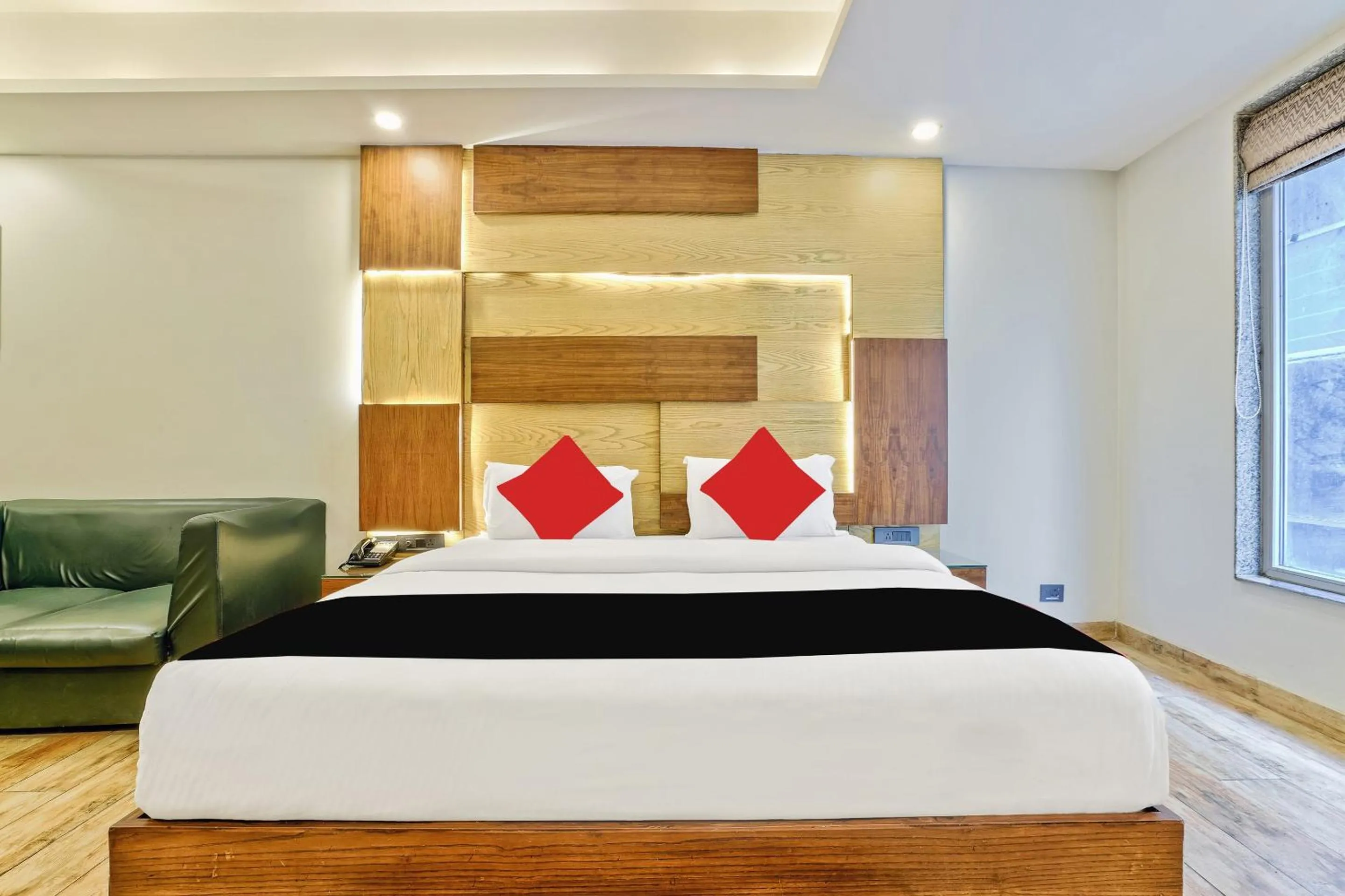Bed in Staybook Hotel Nitya Maharani, Free Airport Pickup