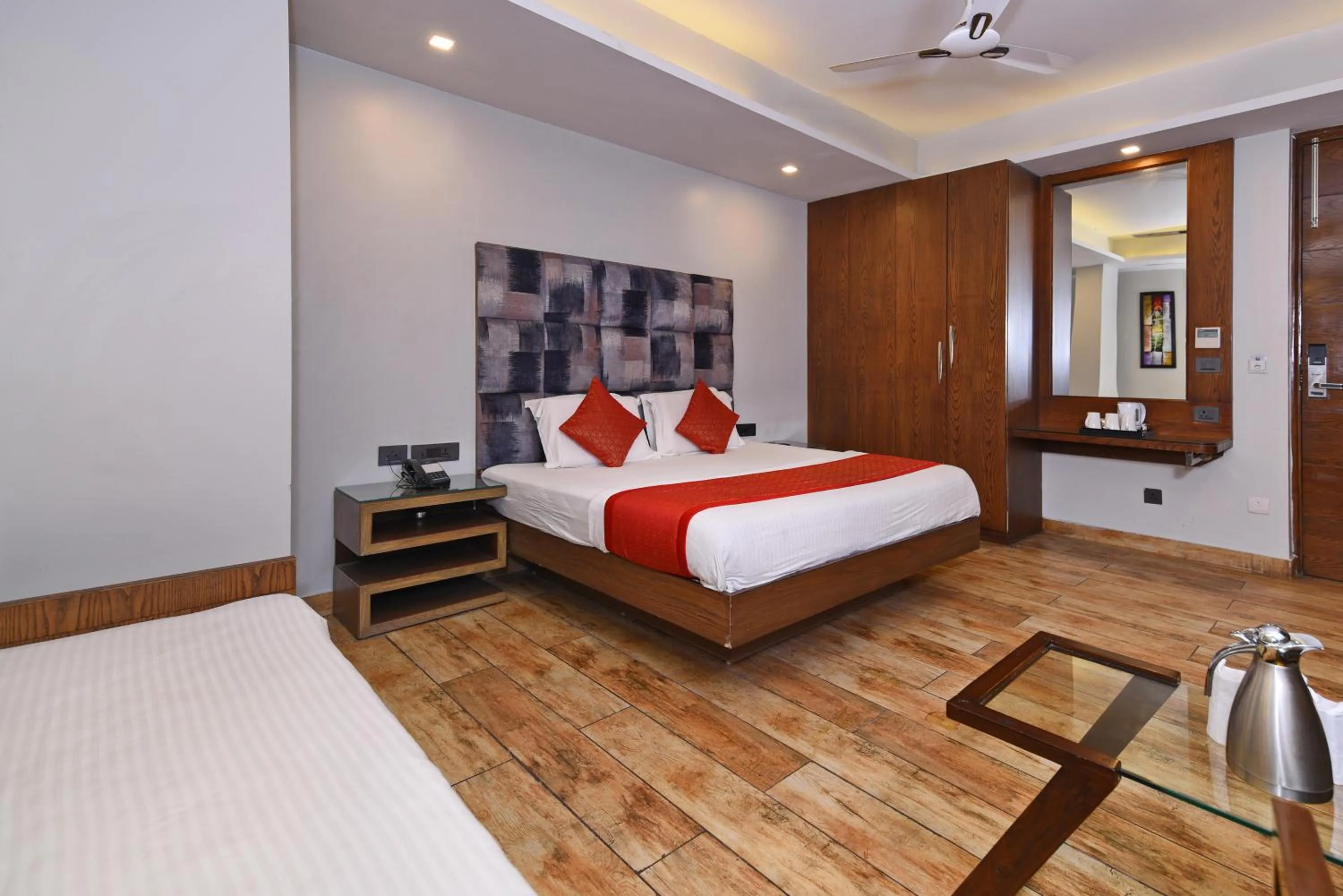 Bed in Staybook Hotel Nitya Maharani, Free Airport Pickup