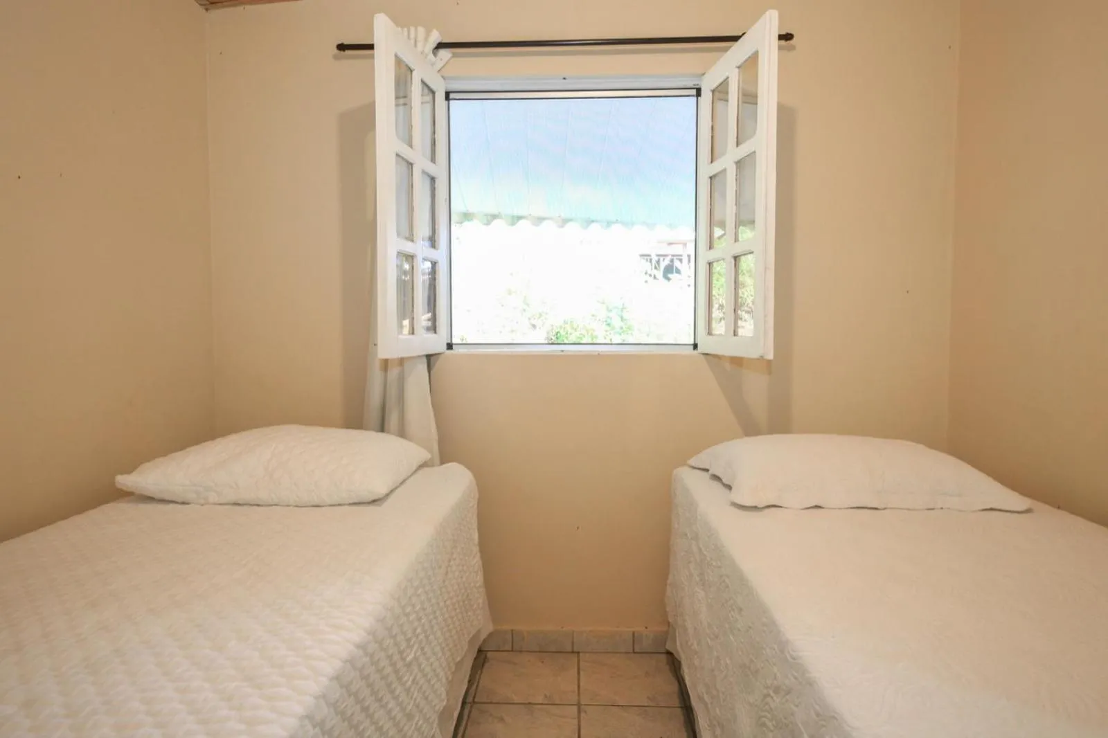 Bed in Pousada Canto do Boldró