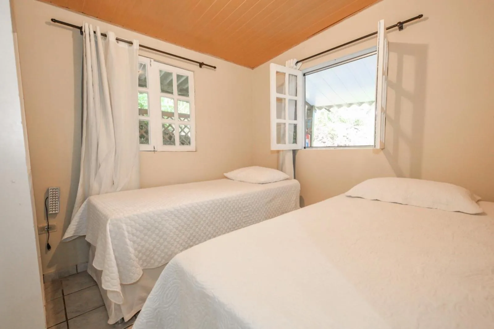 Bed in Pousada Canto do Boldró