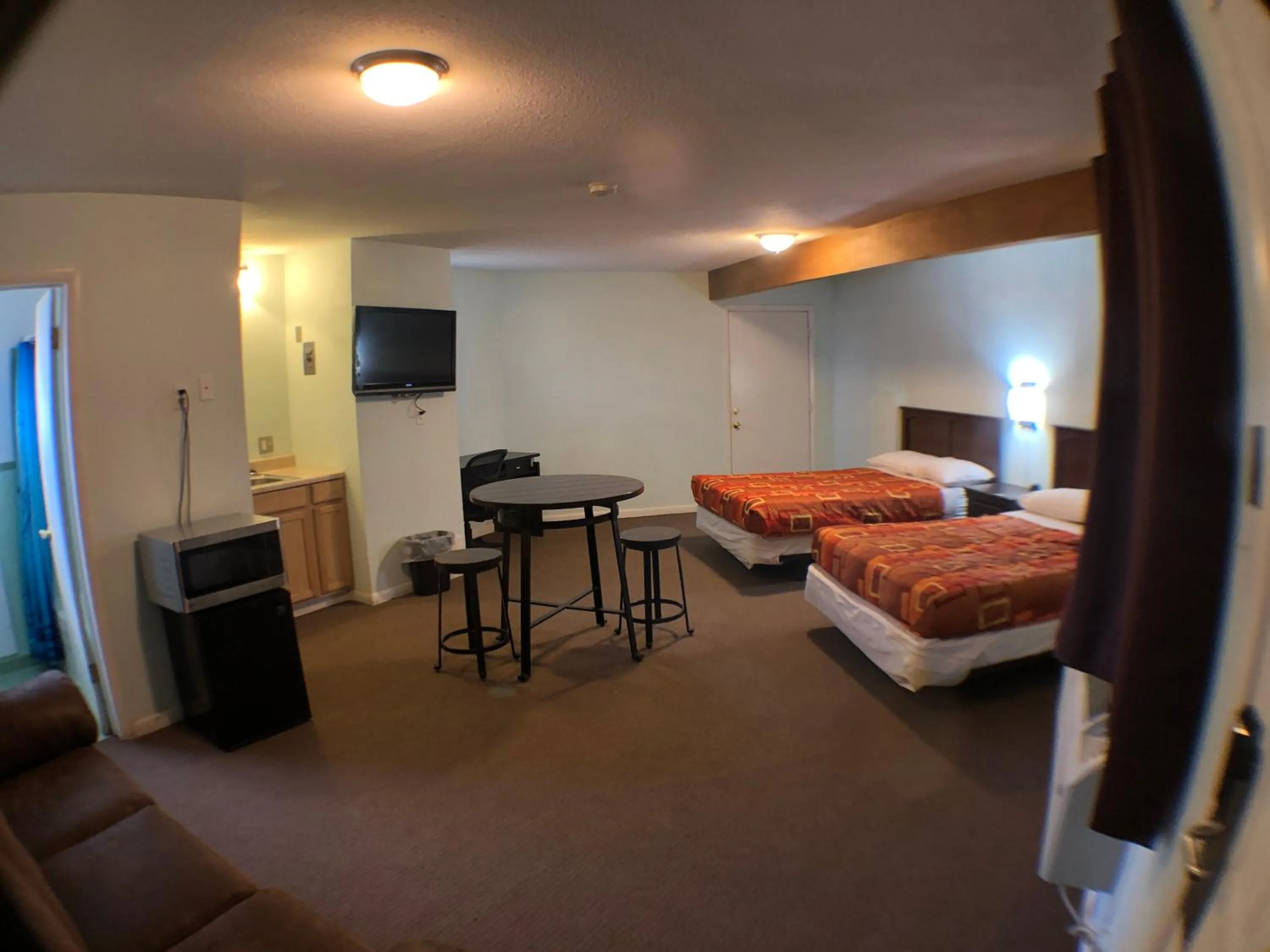 Bed in Tower 64 Motel & RV