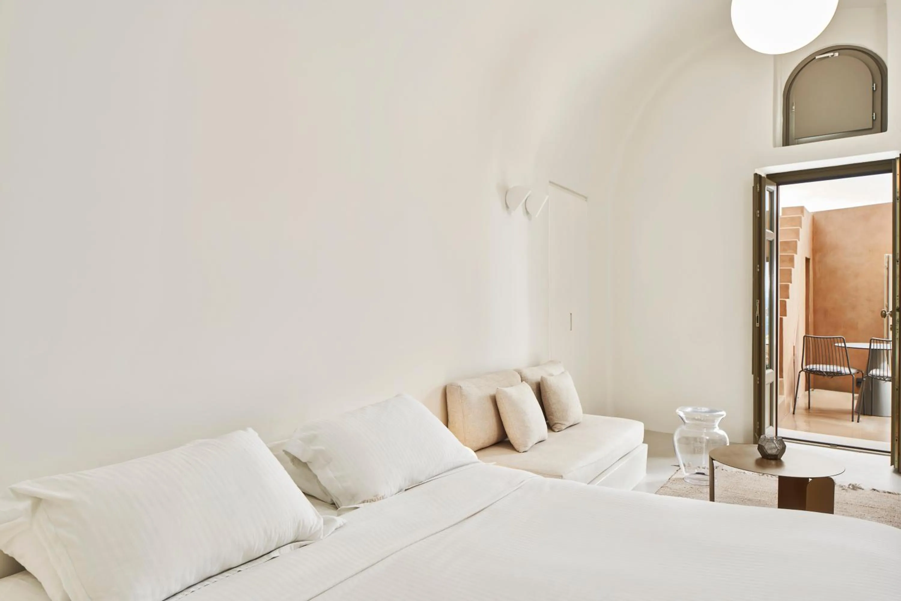 Seating area, Bed in Old Castle Oia