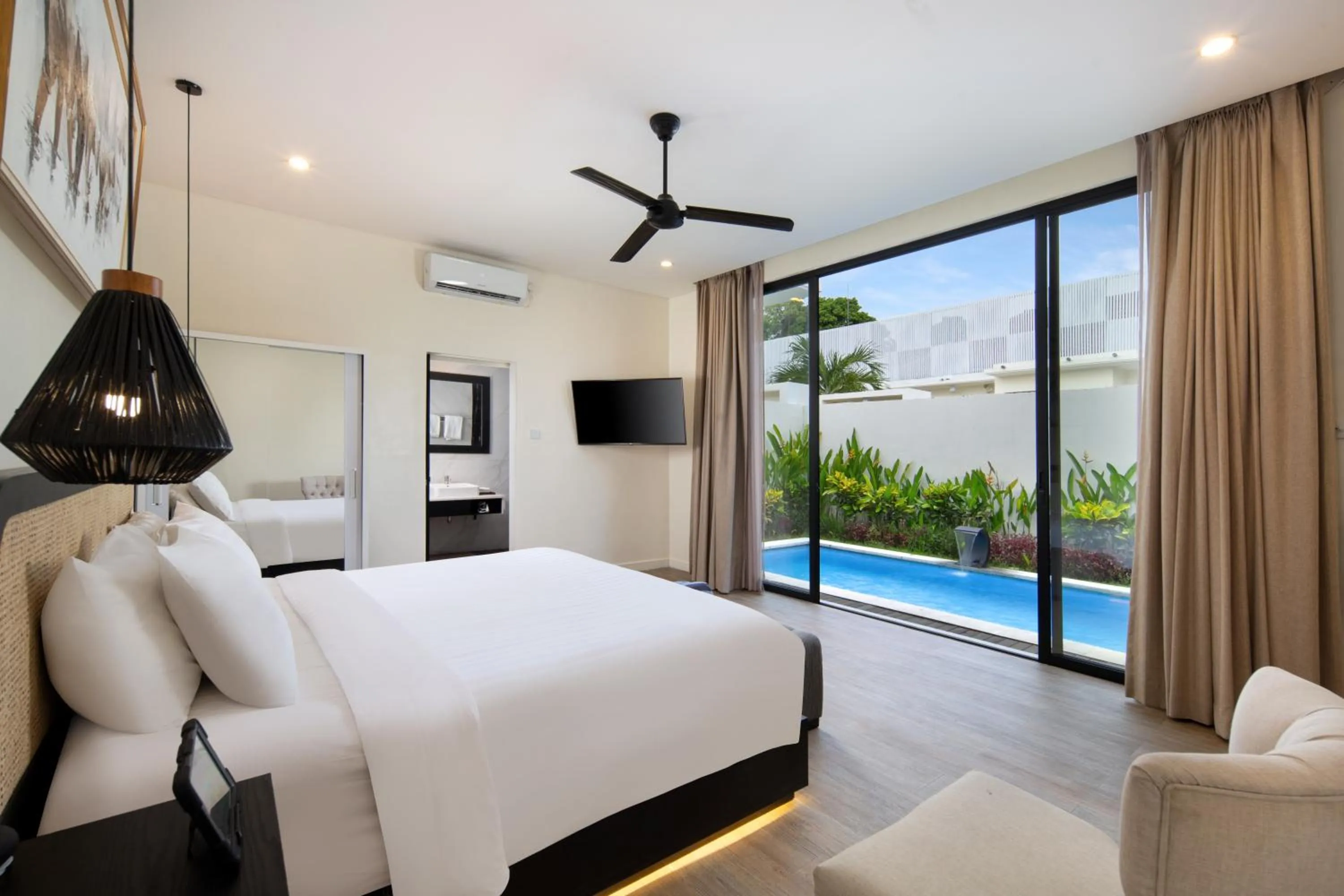 Bed in The Grand Daha Luxury Villas