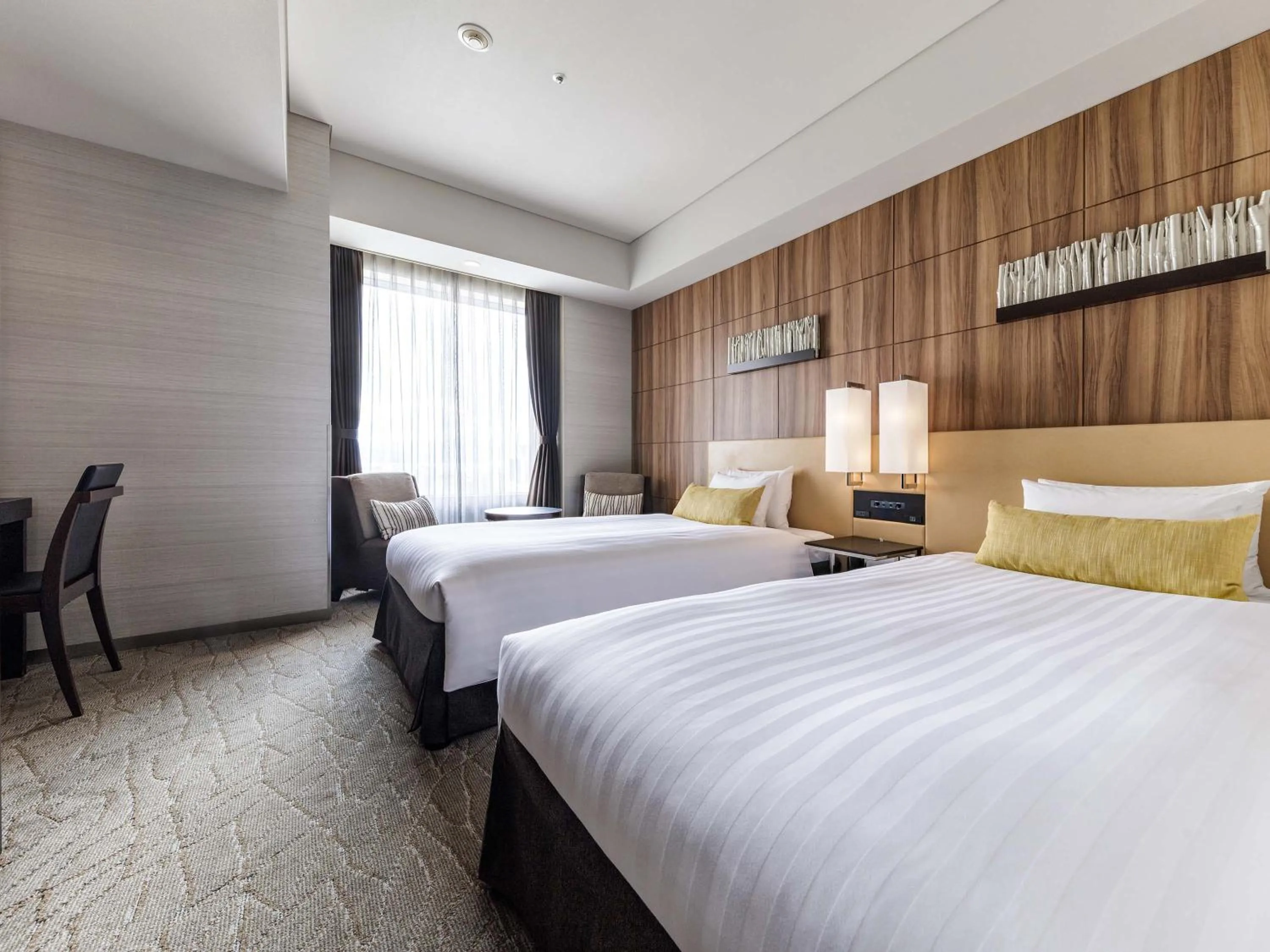 Photo of the whole room, Bed in Solaria Nishitetsu Hotel Kagoshima