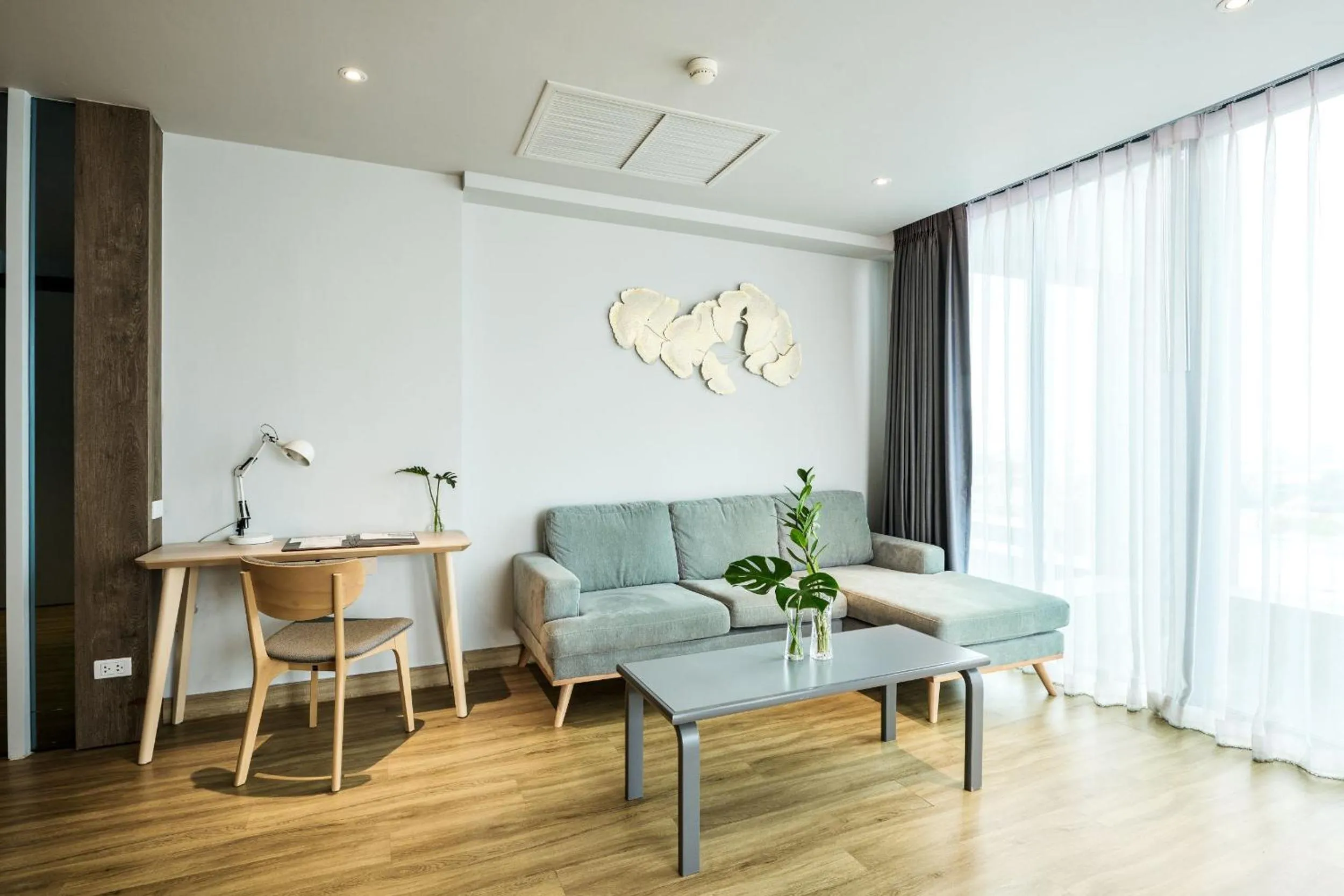 Living room in TK Palace Hotel & Convention Bangkok