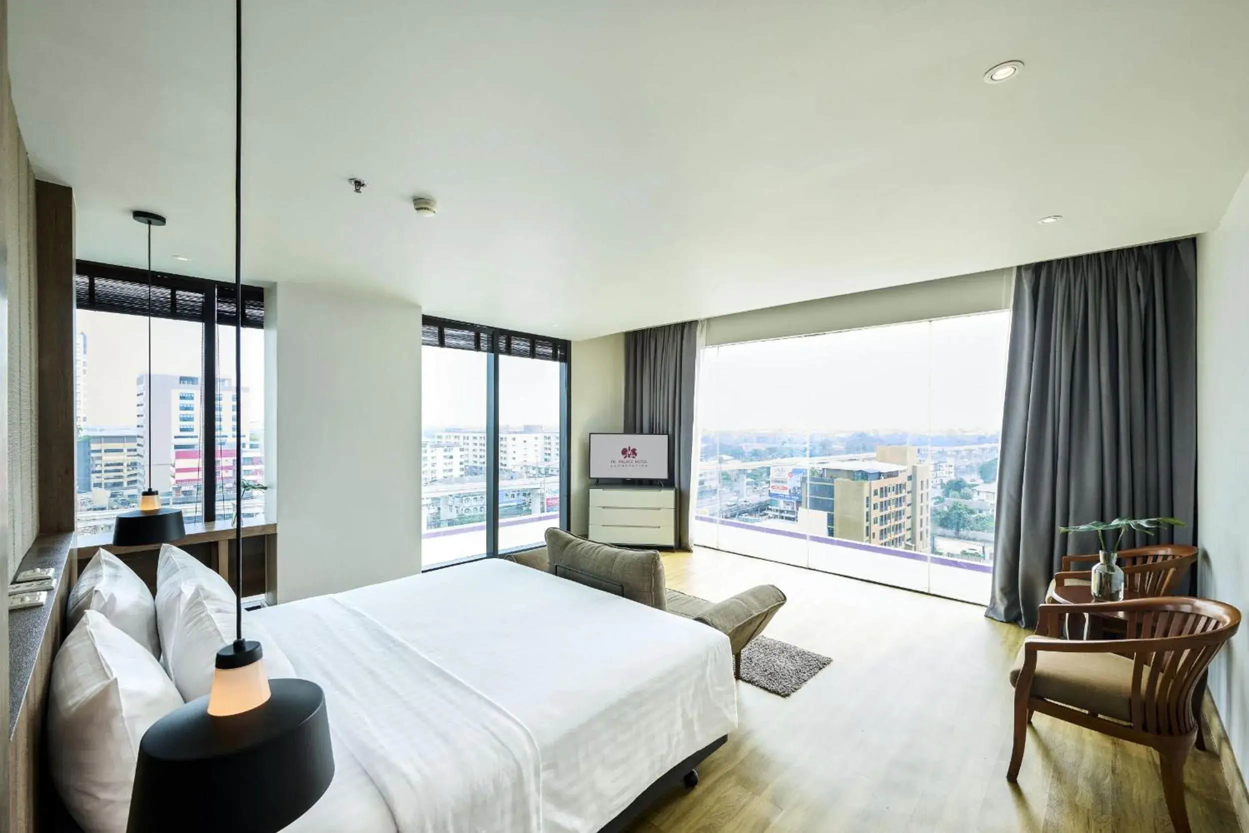Communal lounge/ TV room, Bed in TK Palace Hotel & Convention Bangkok Communal lounge/ TV room, Bed in TK Palace Hotel & Convention Bangkok