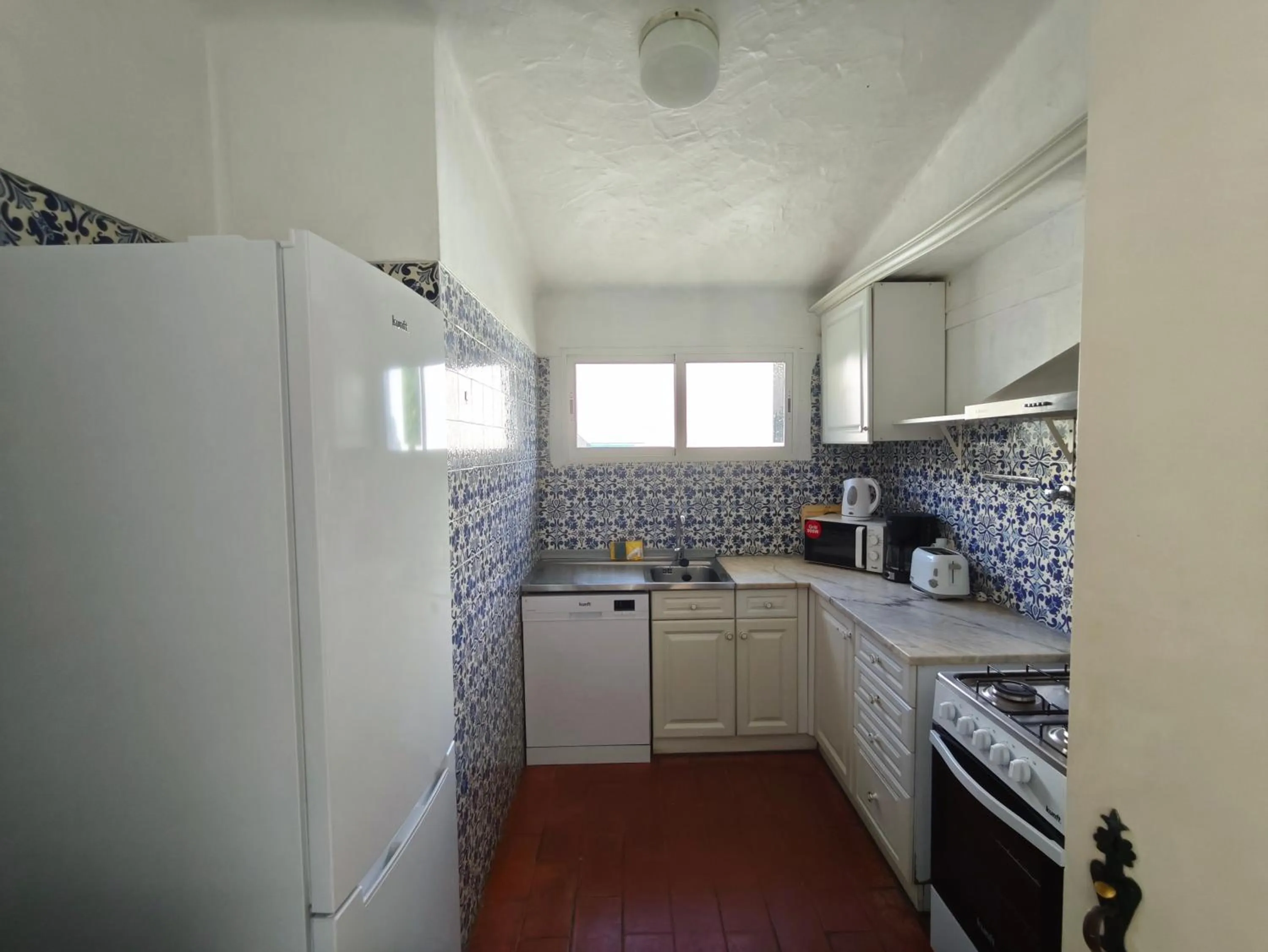 kitchen in Aldeamento Turistico da Prainha