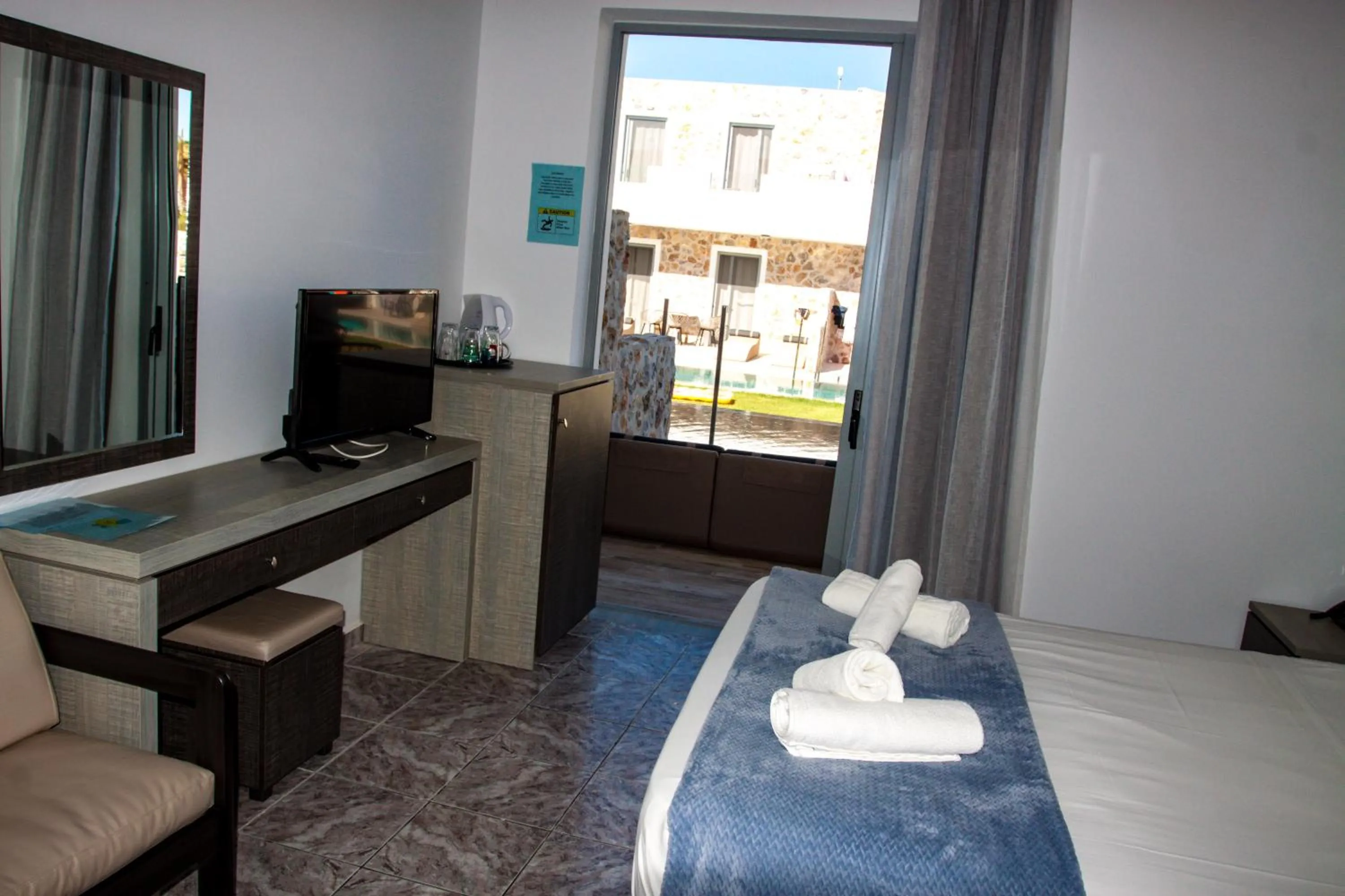 Bed in Sunshine Hotel Tigaki