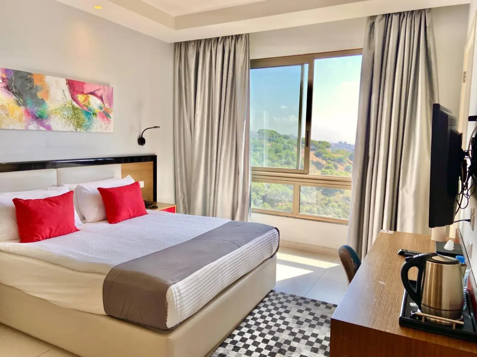 Deluxe Double Room (2 Adults + 1 Child) in The Ray Hotel and Studios Deluxe Double Room (2 Adults + 1 Child) in The Ray Hotel and Studios