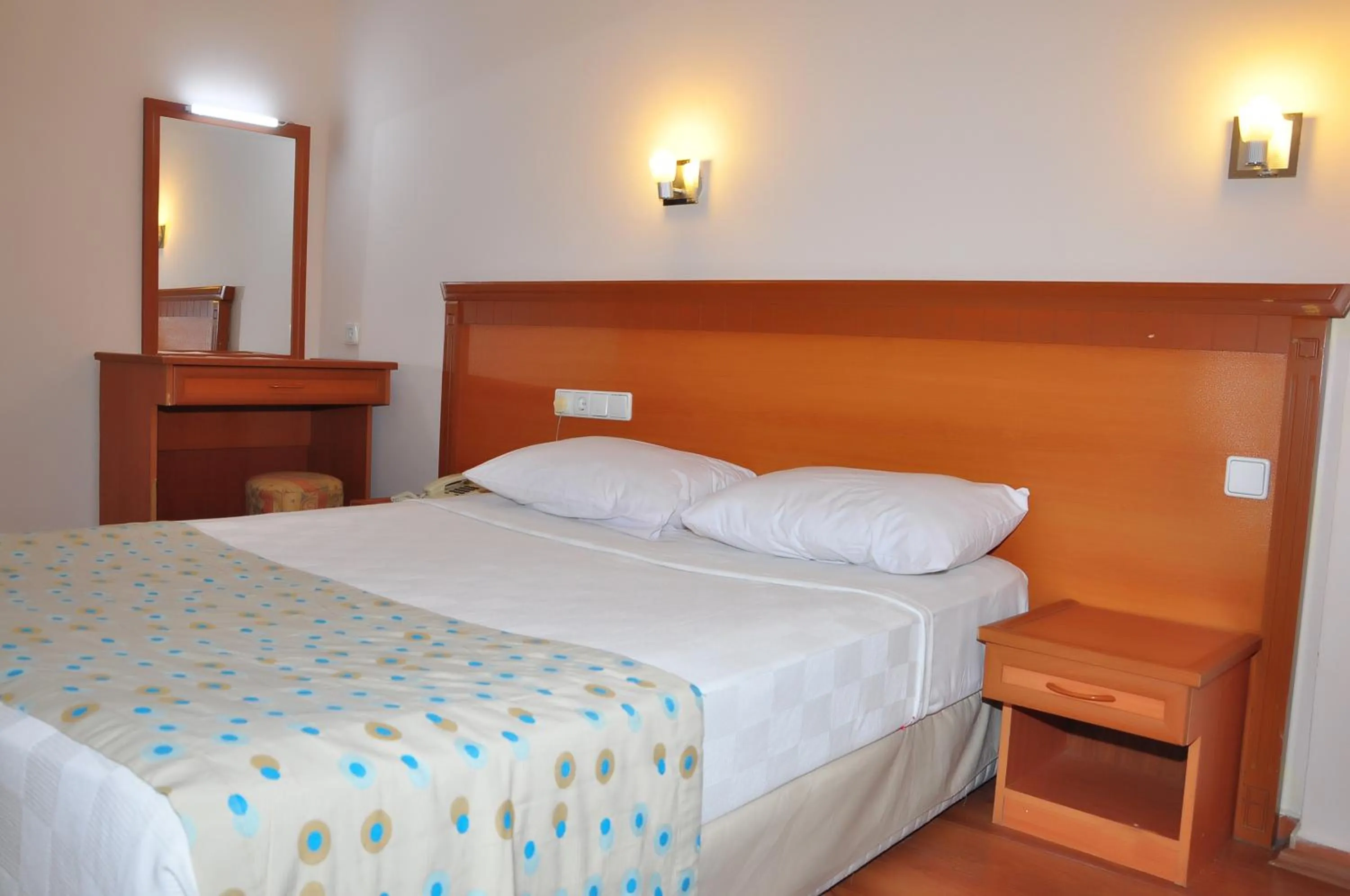 Bed in Cinar Family Suite Hotel