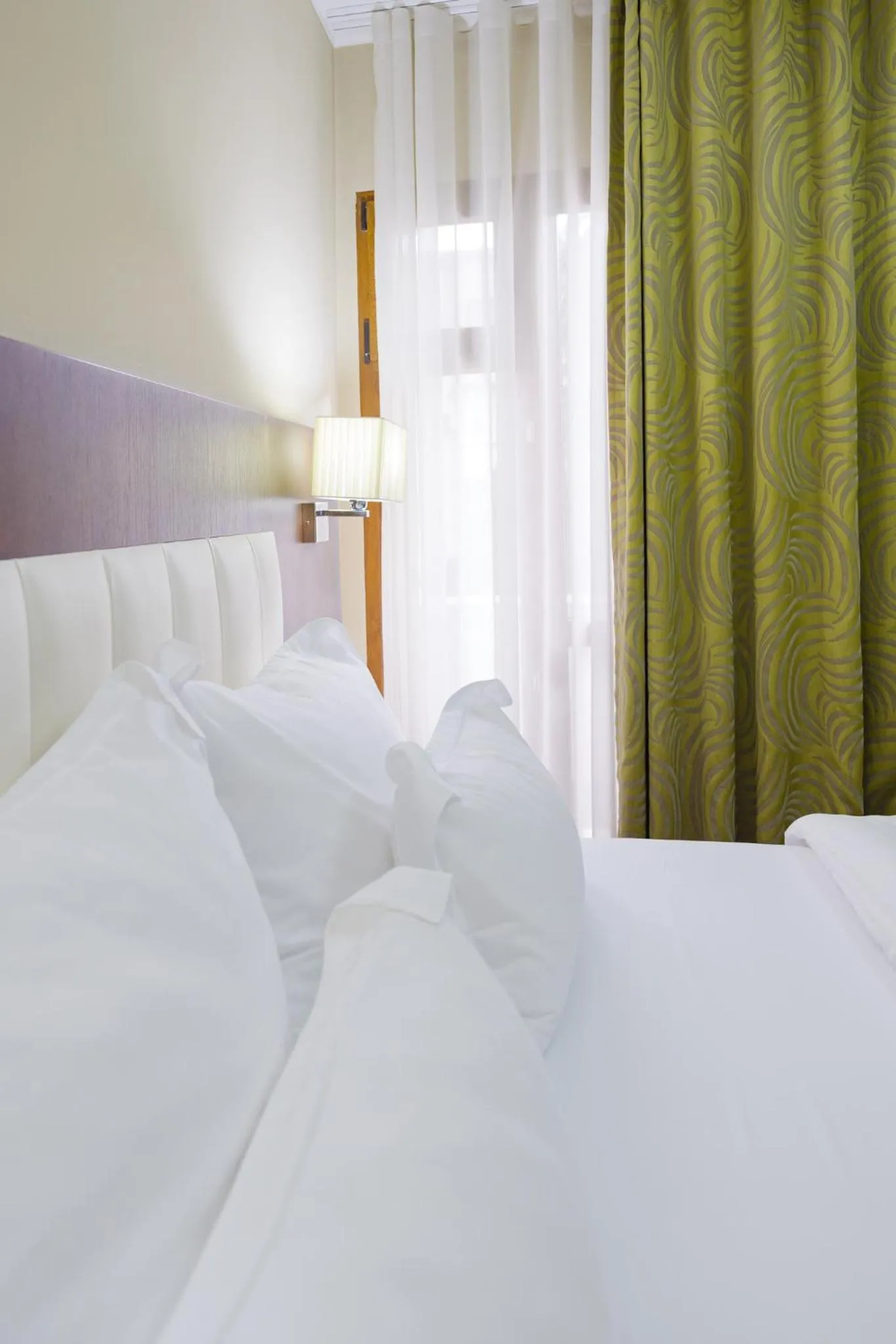 Bed in Hotel Pietroasa