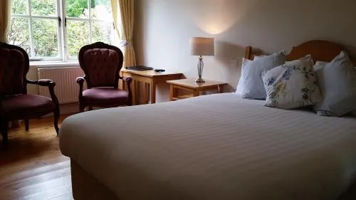 Bed in The Waterfront Hotel