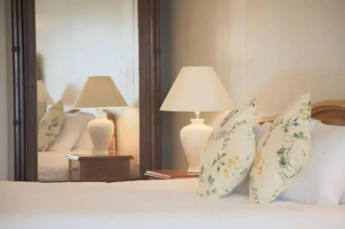 Bed in The Waterfront Hotel