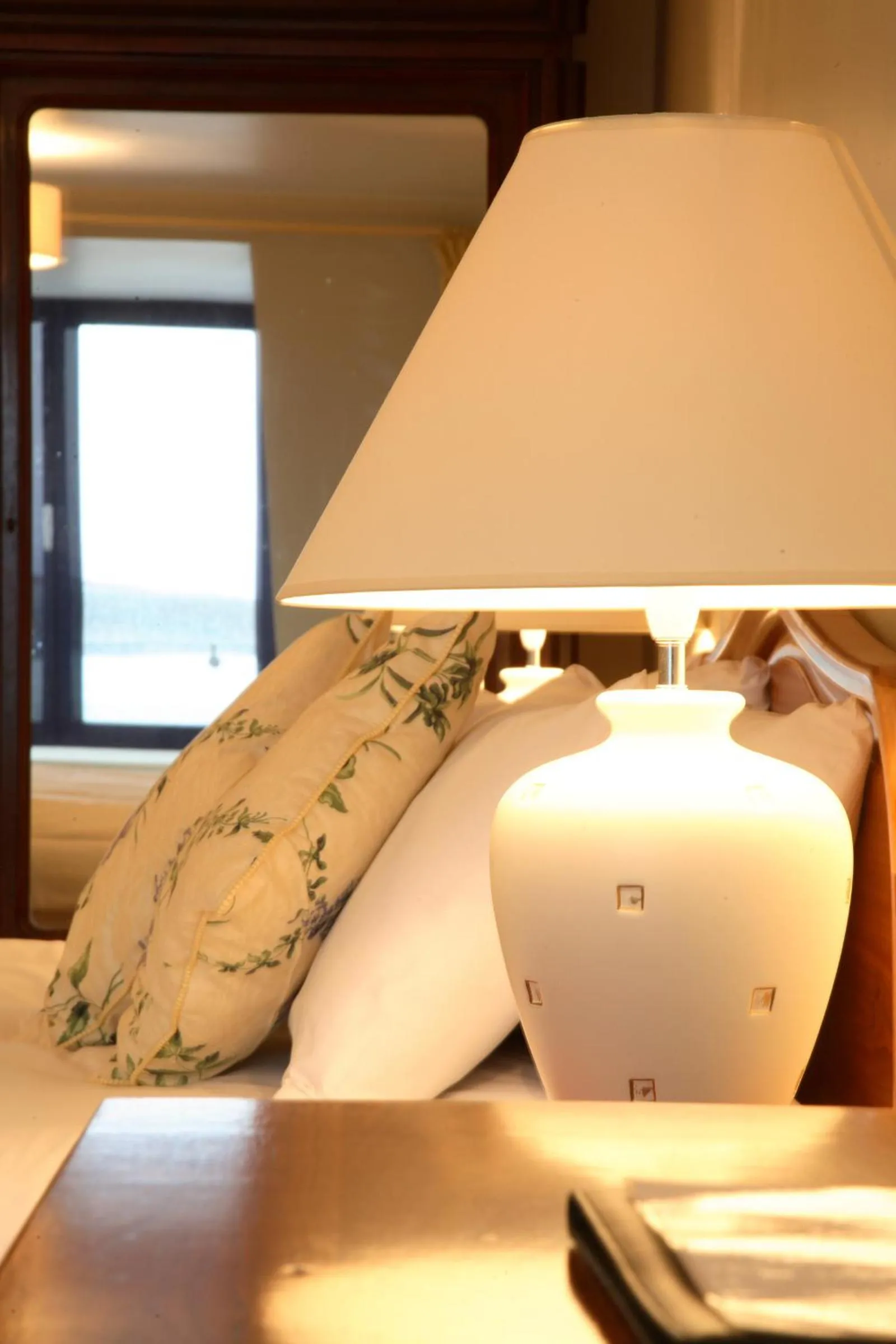 Bed in The Waterfront Hotel