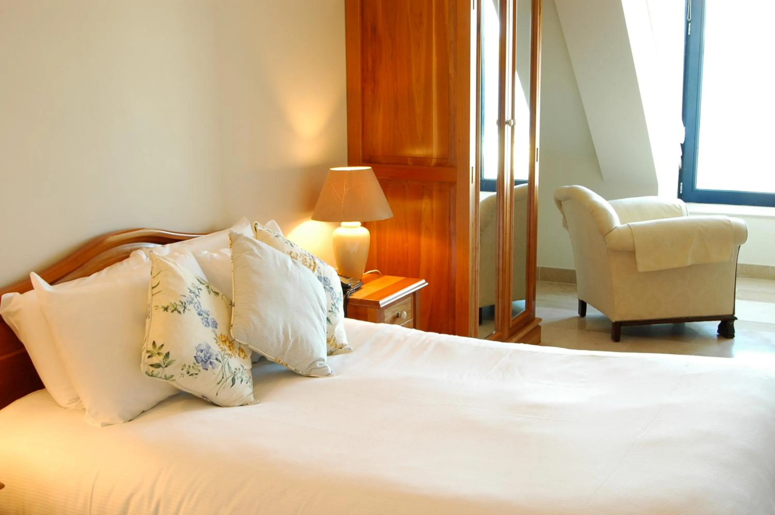 Bed in The Waterfront Hotel