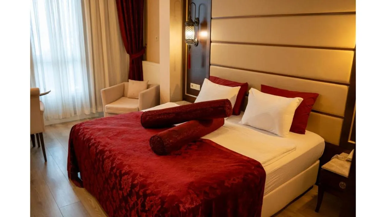 Bed in Kronos Hotel