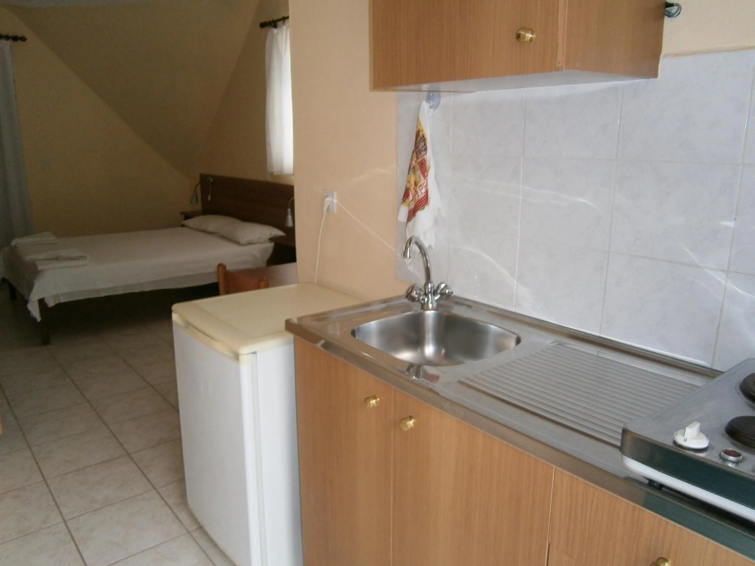 Kitchen or kitchenette, Bed in Petros Studios