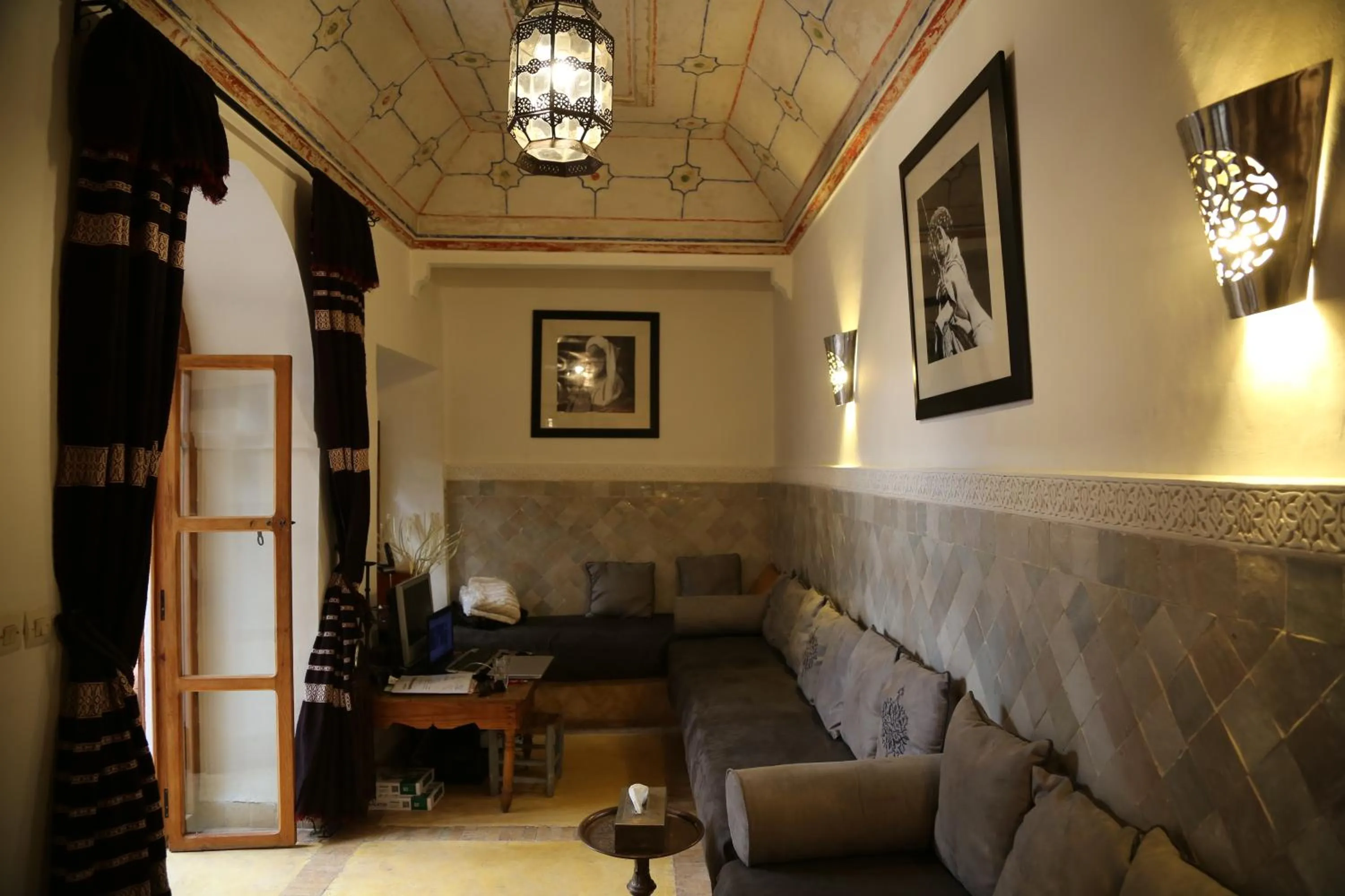 Communal lounge/ TV room in Riad Villa El Arsa