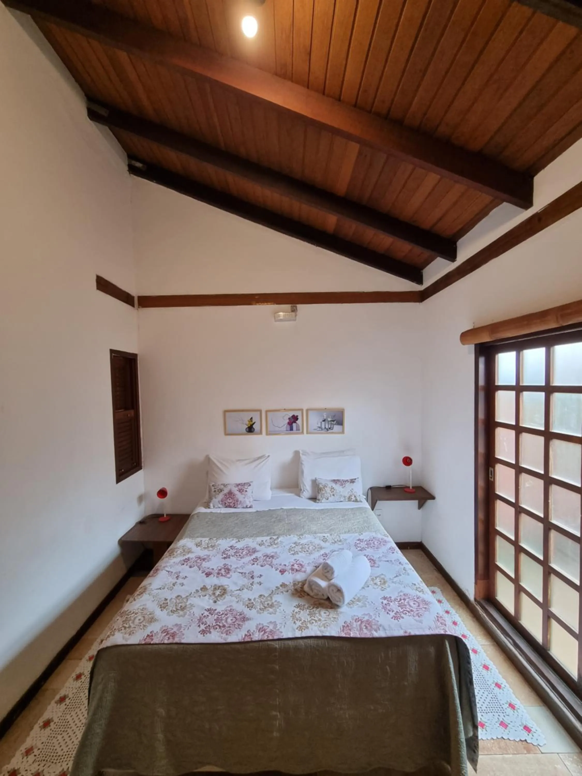 Bed in Pousada Ikabana