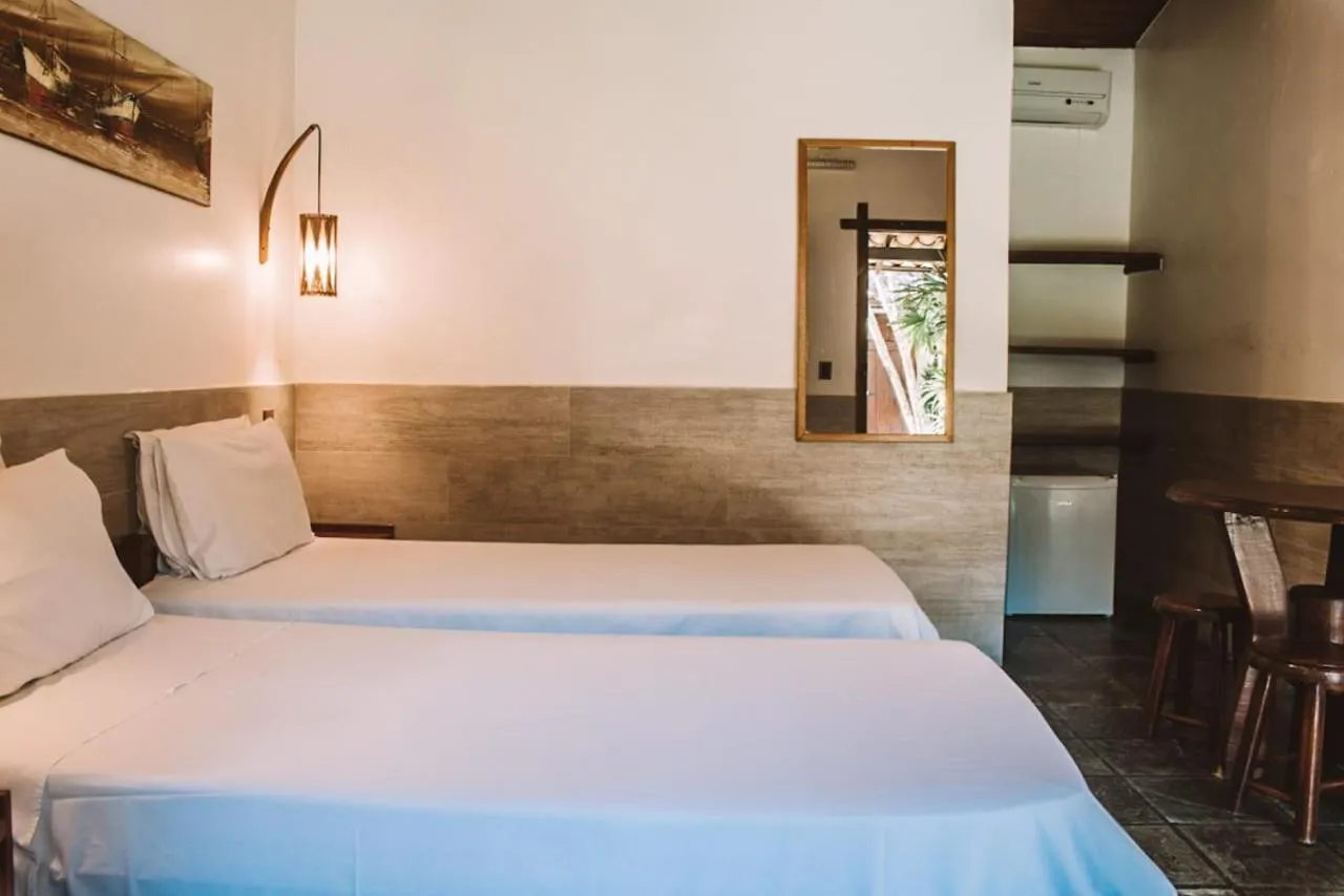 Bed in Pousada El Capitan