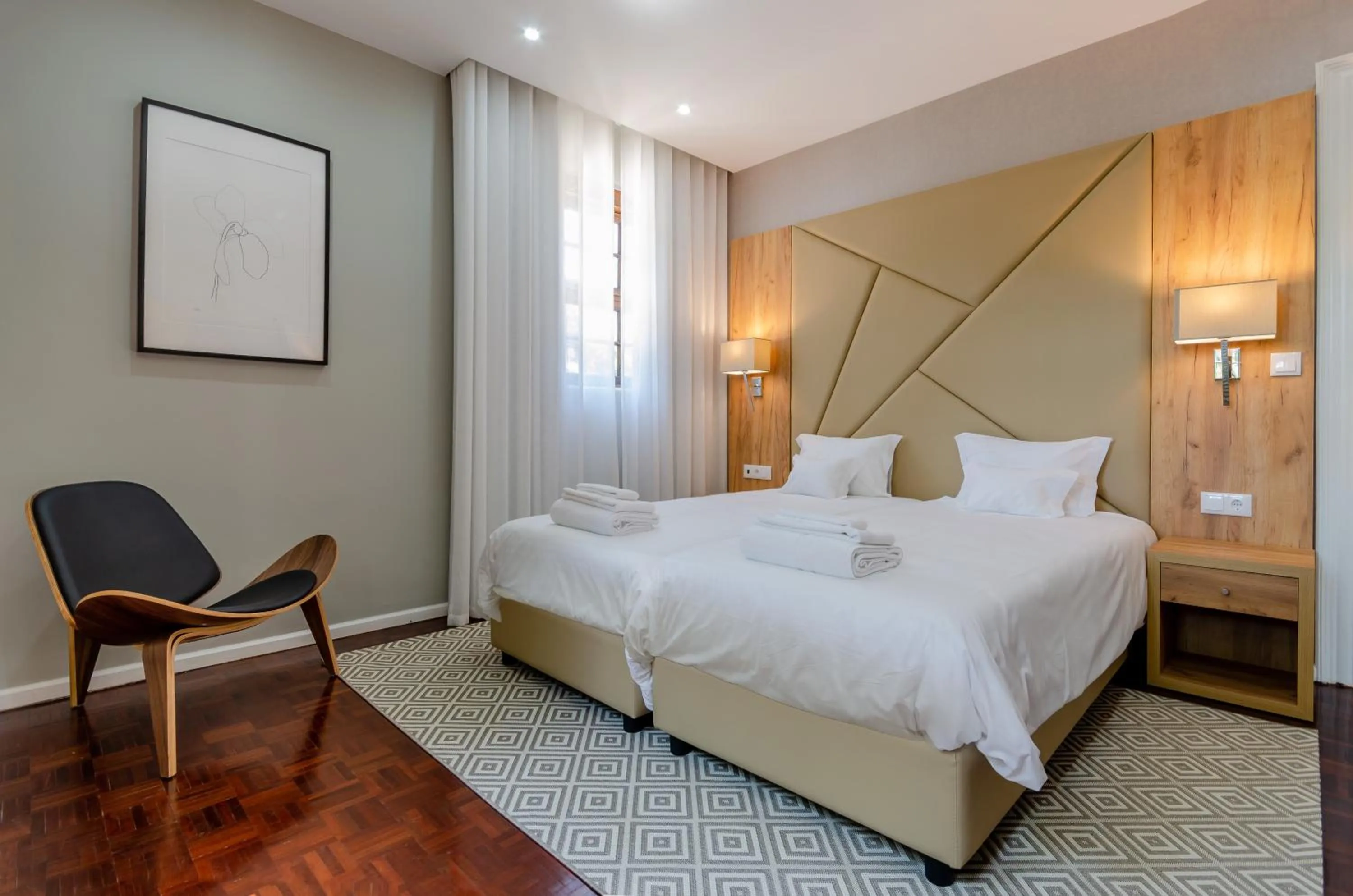 Bed in Le Jardin Lisbon