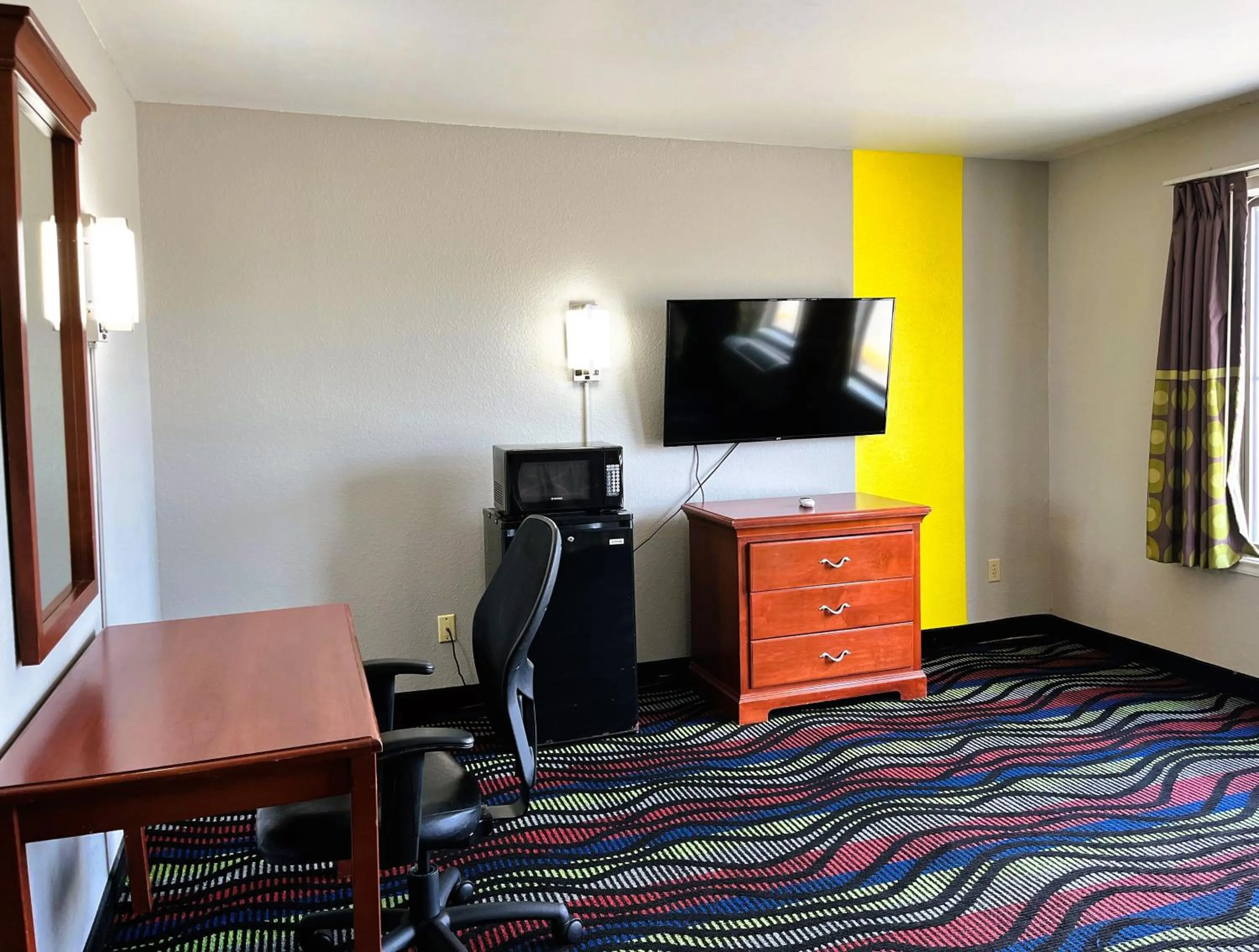 Seating area in Super 8 by Wyndham Vincennes