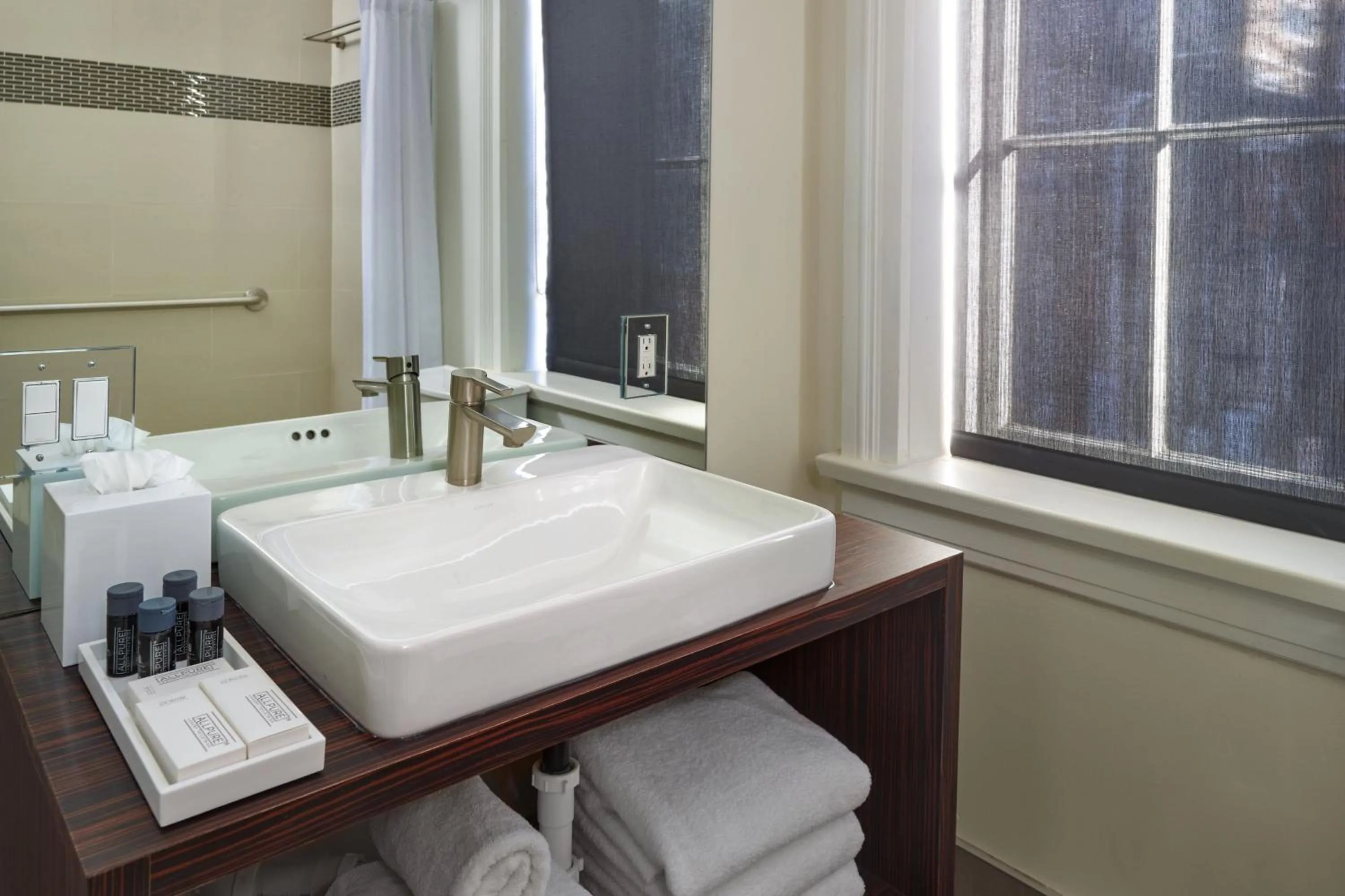 Bathroom in The Tremont House, Galveston, a Tribute Portfolio Hotel