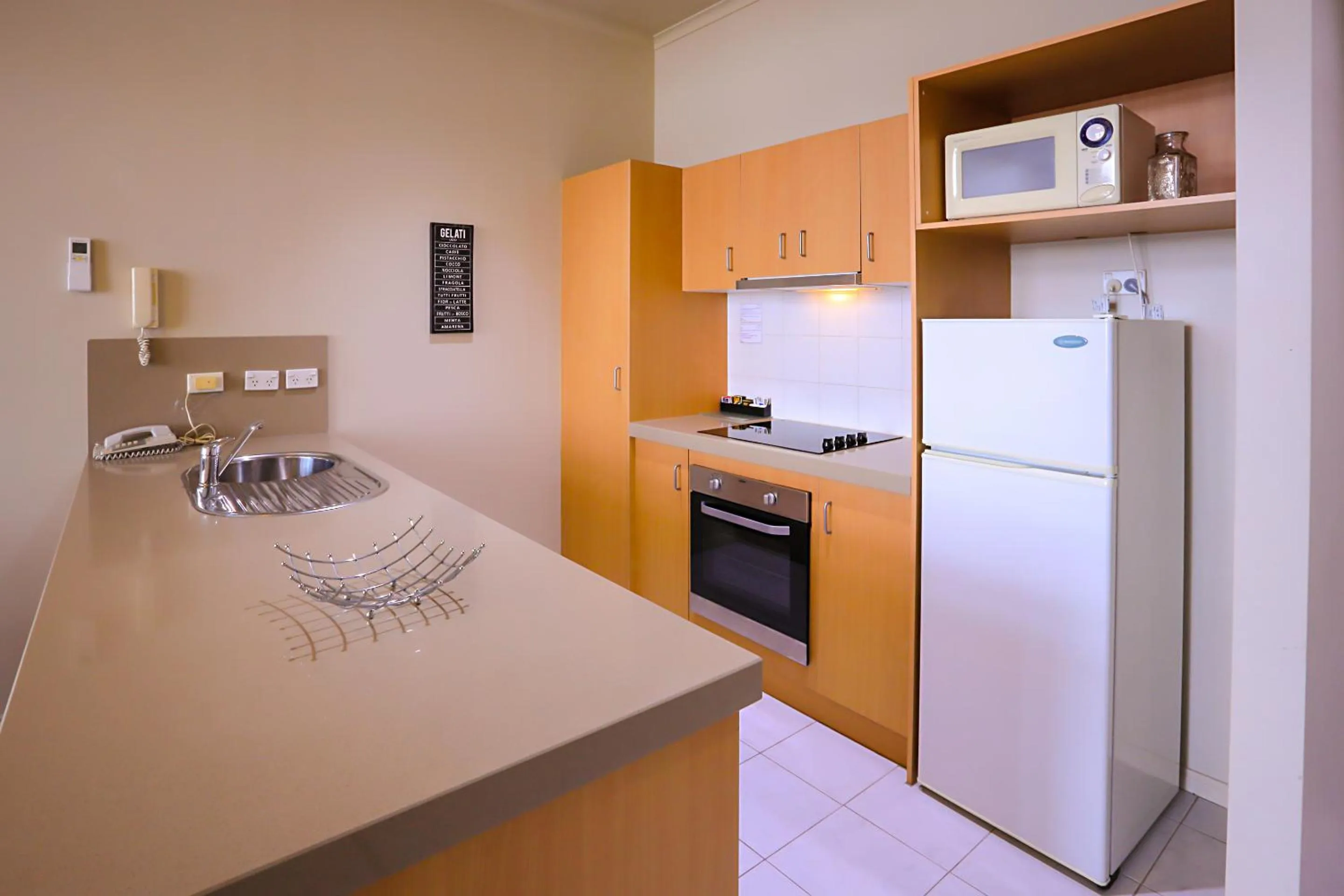 Kitchen or kitchenette in Flinders Landing Apartments