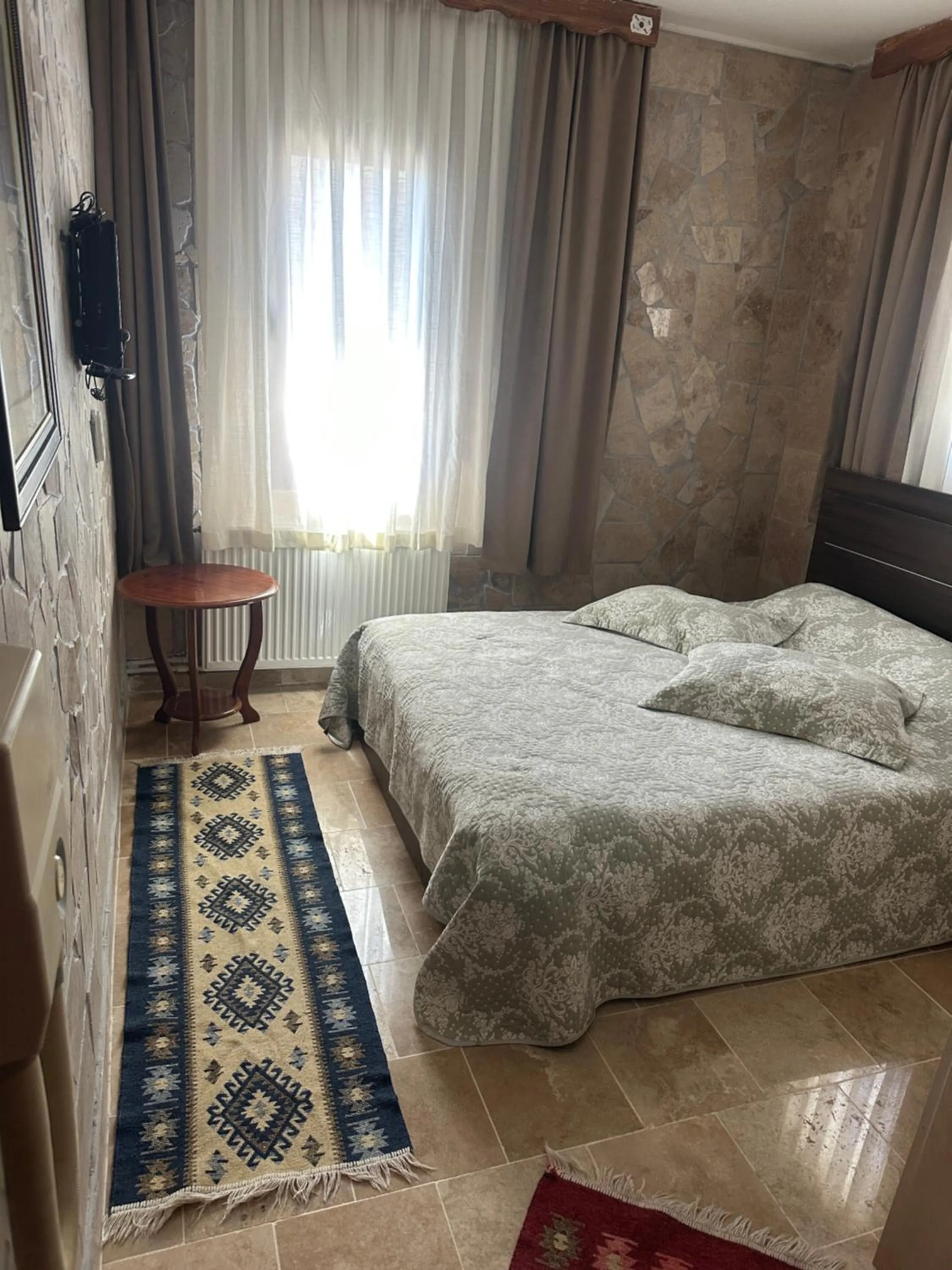 Bed in Uchisar Cave House