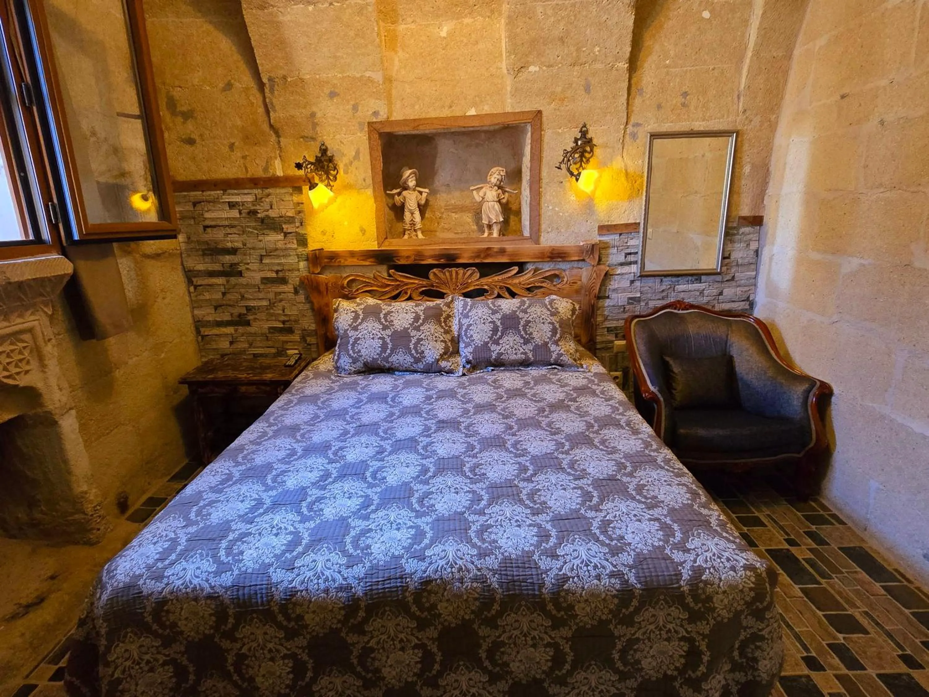 Bed in Uchisar Cave House