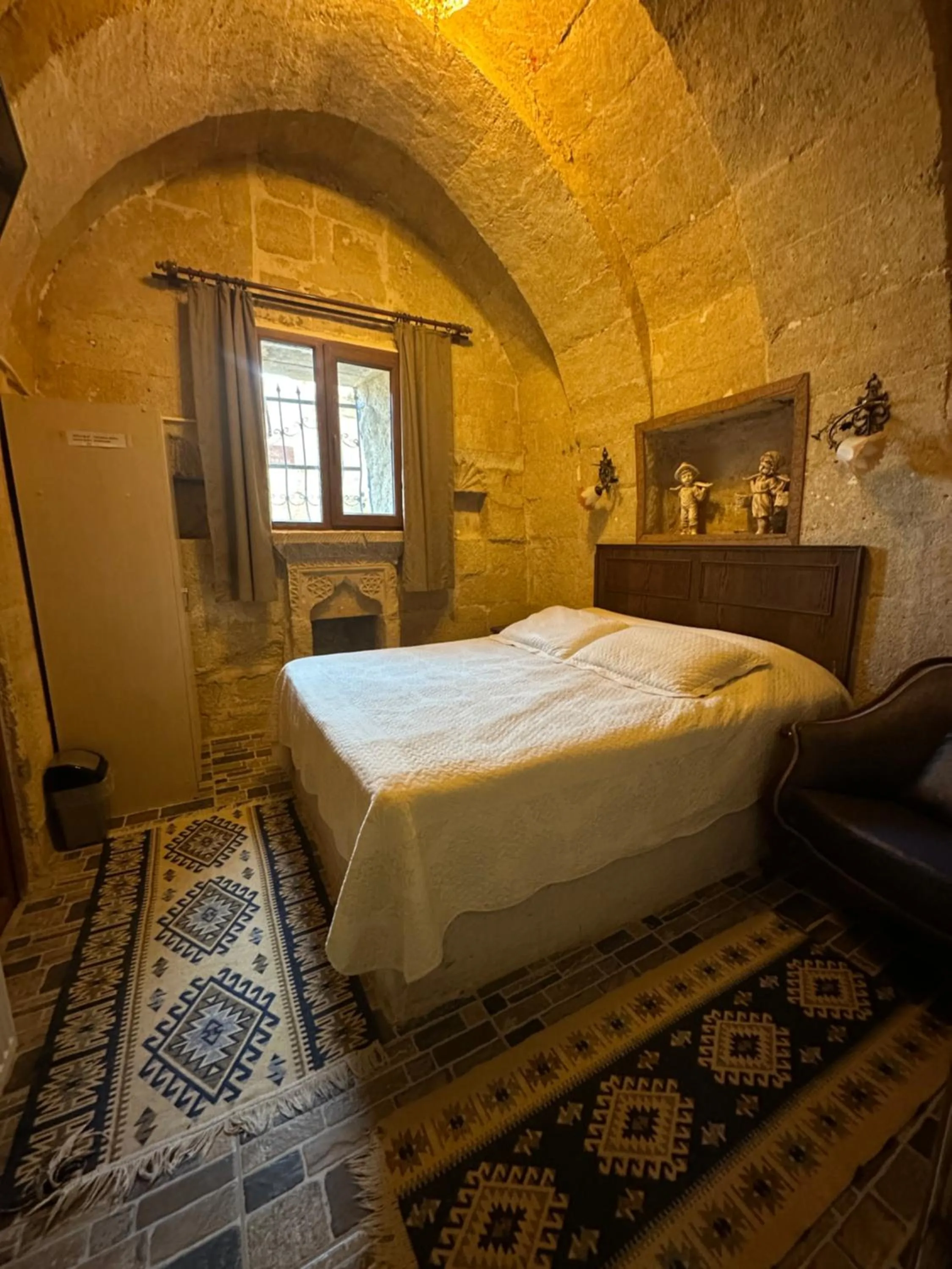 Bed in Uchisar Cave House