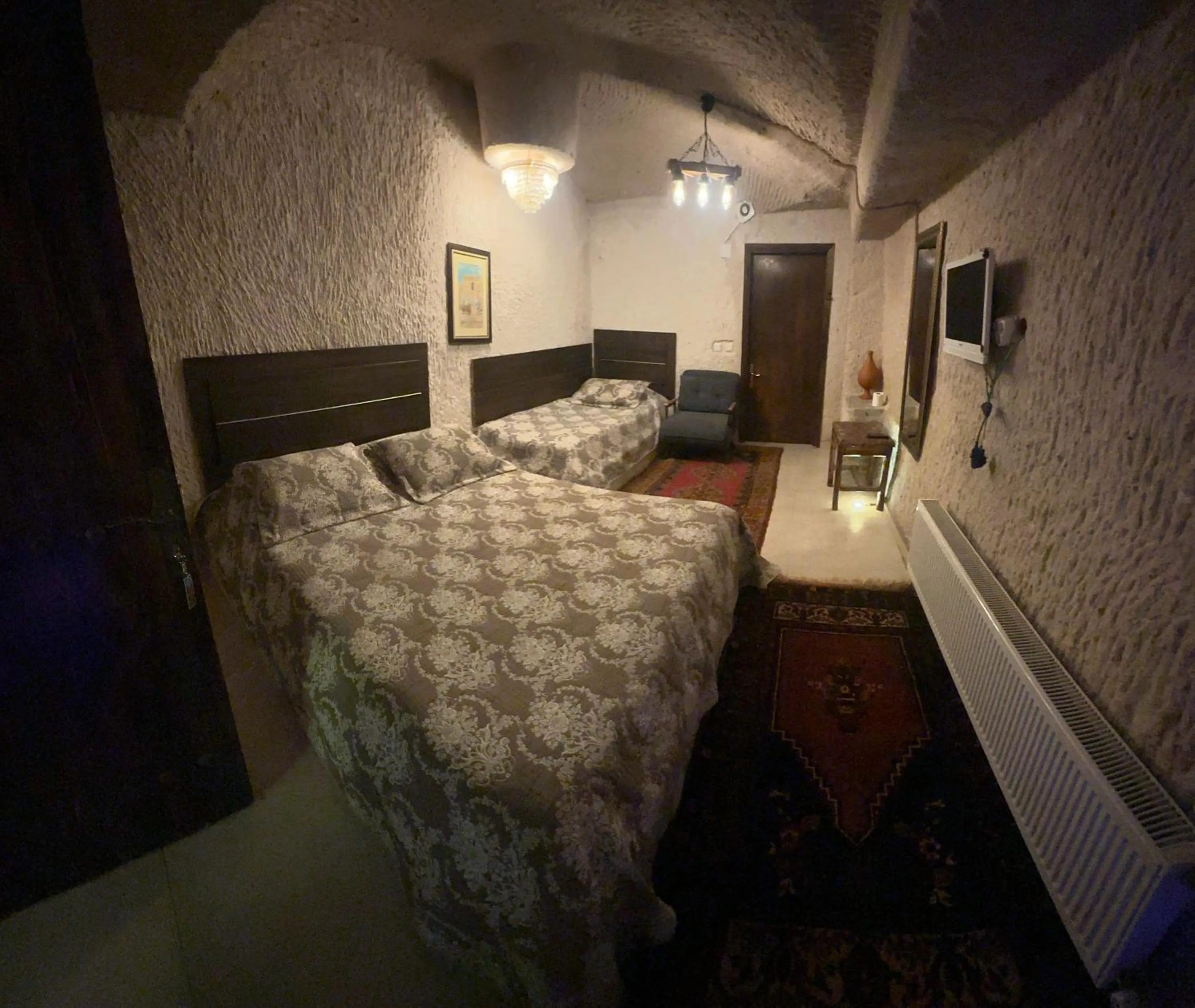 Bed in Uchisar Cave House
