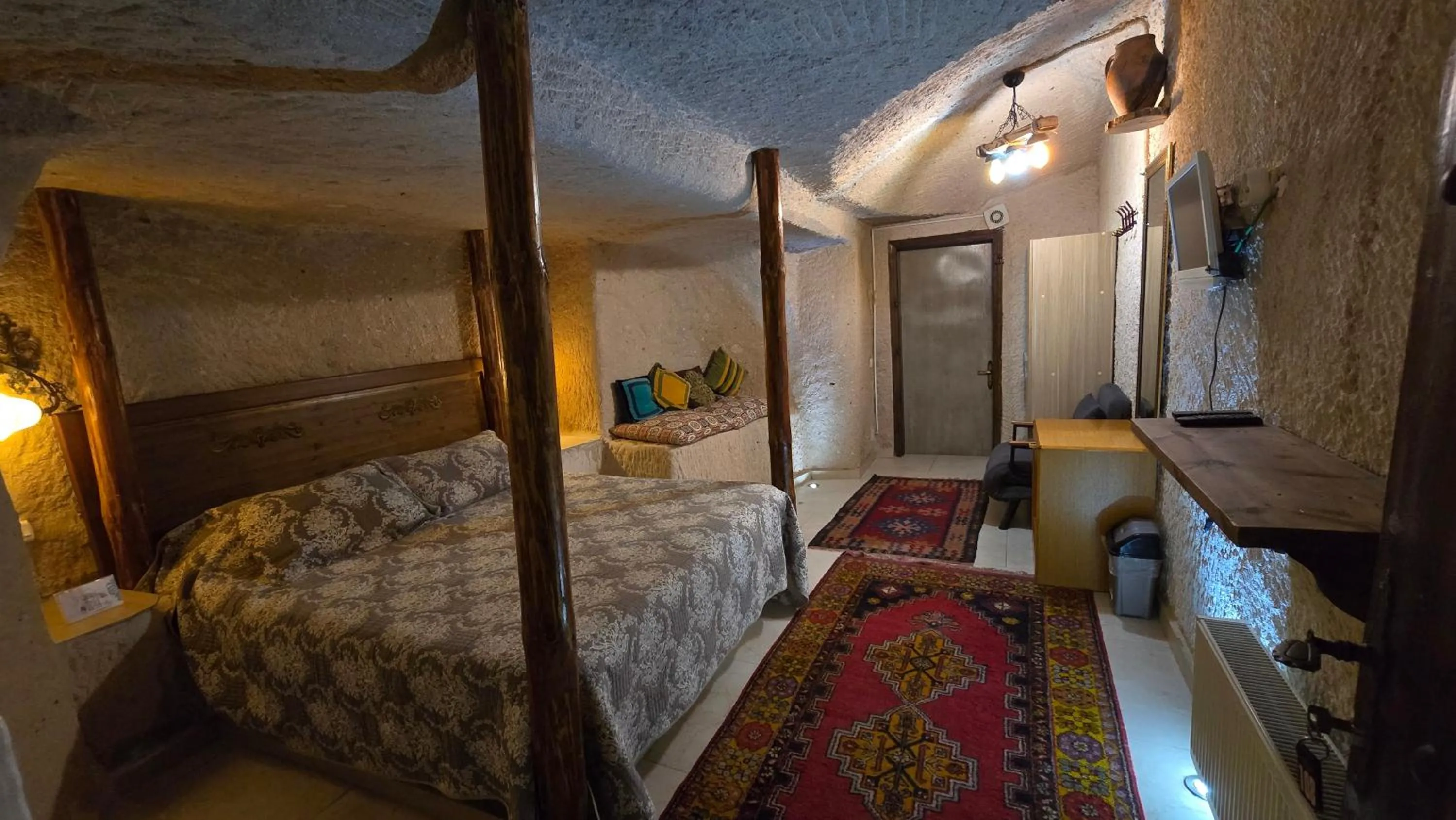 Bed in Uchisar Cave House