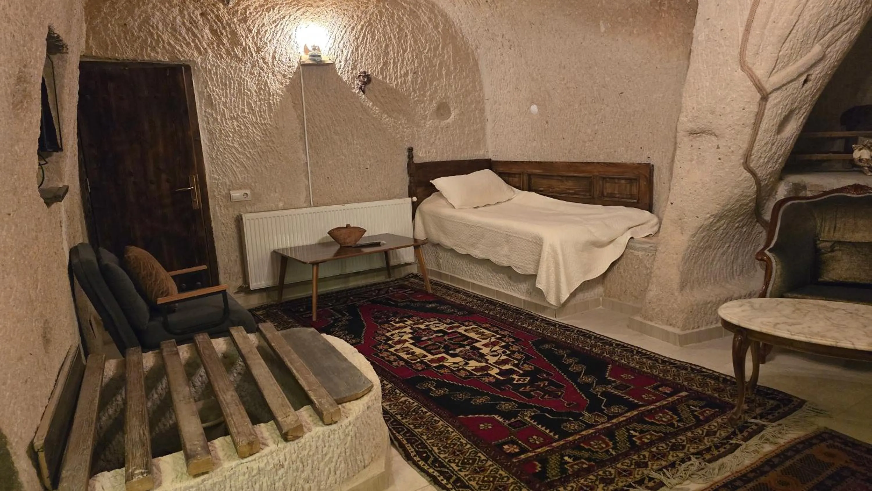 cot in Uchisar Cave House