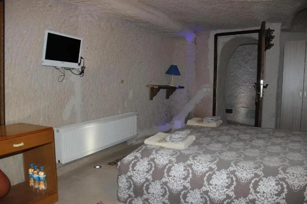 Bed in Uchisar Cave House