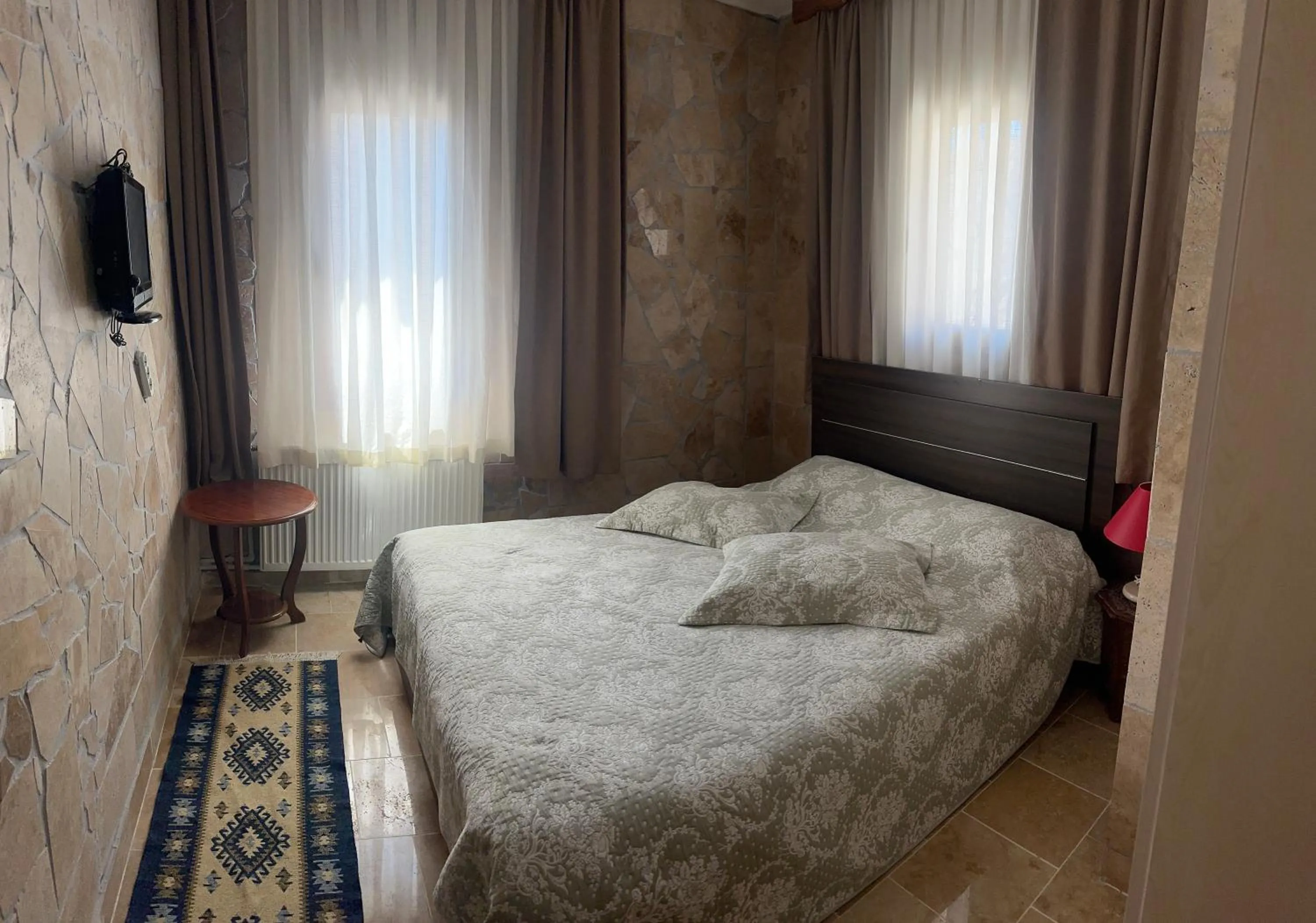 Bed in Uchisar Cave House