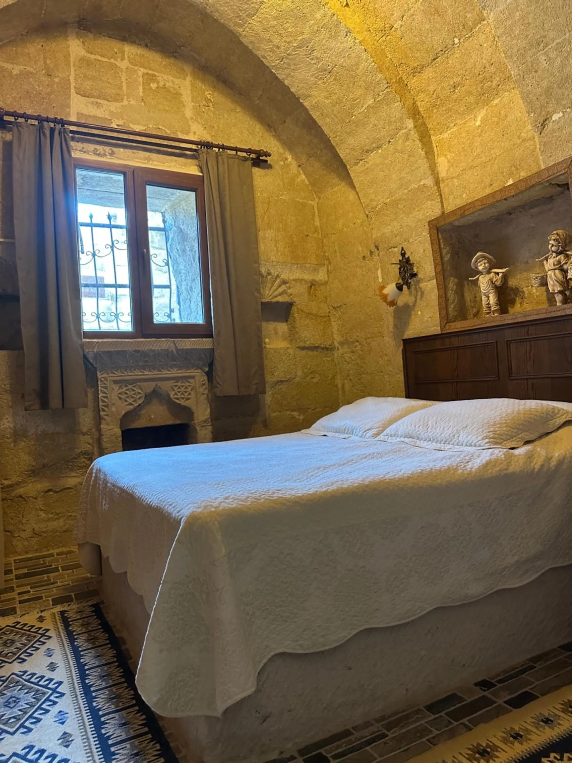 Bed in Uchisar Cave House