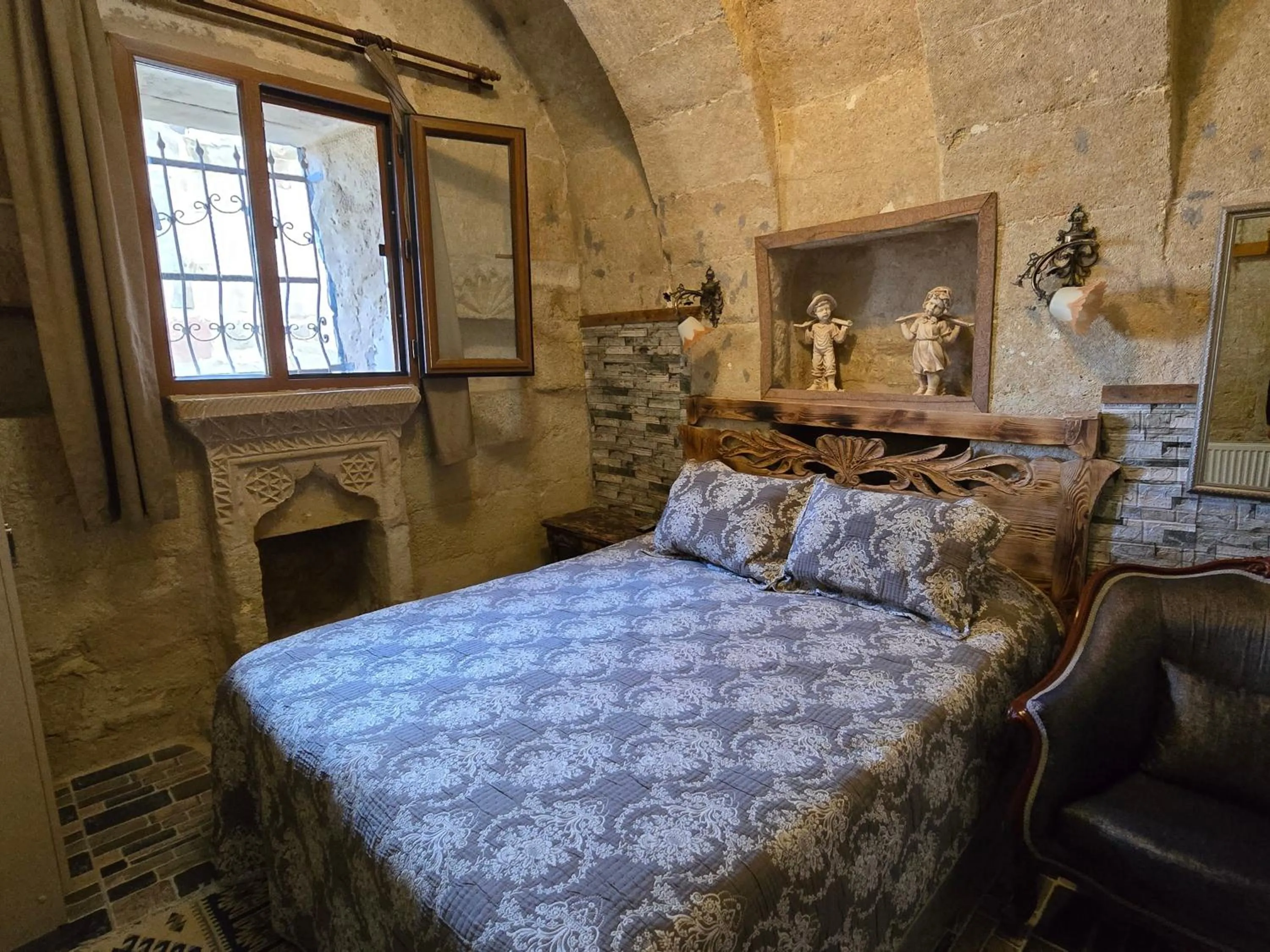 Bed in Uchisar Cave House